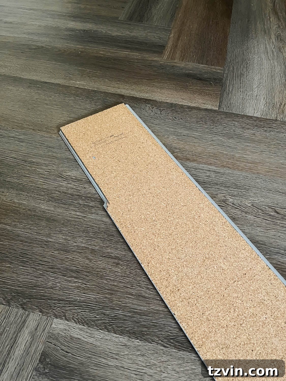 cork LVP underlayment in herringbone pattern