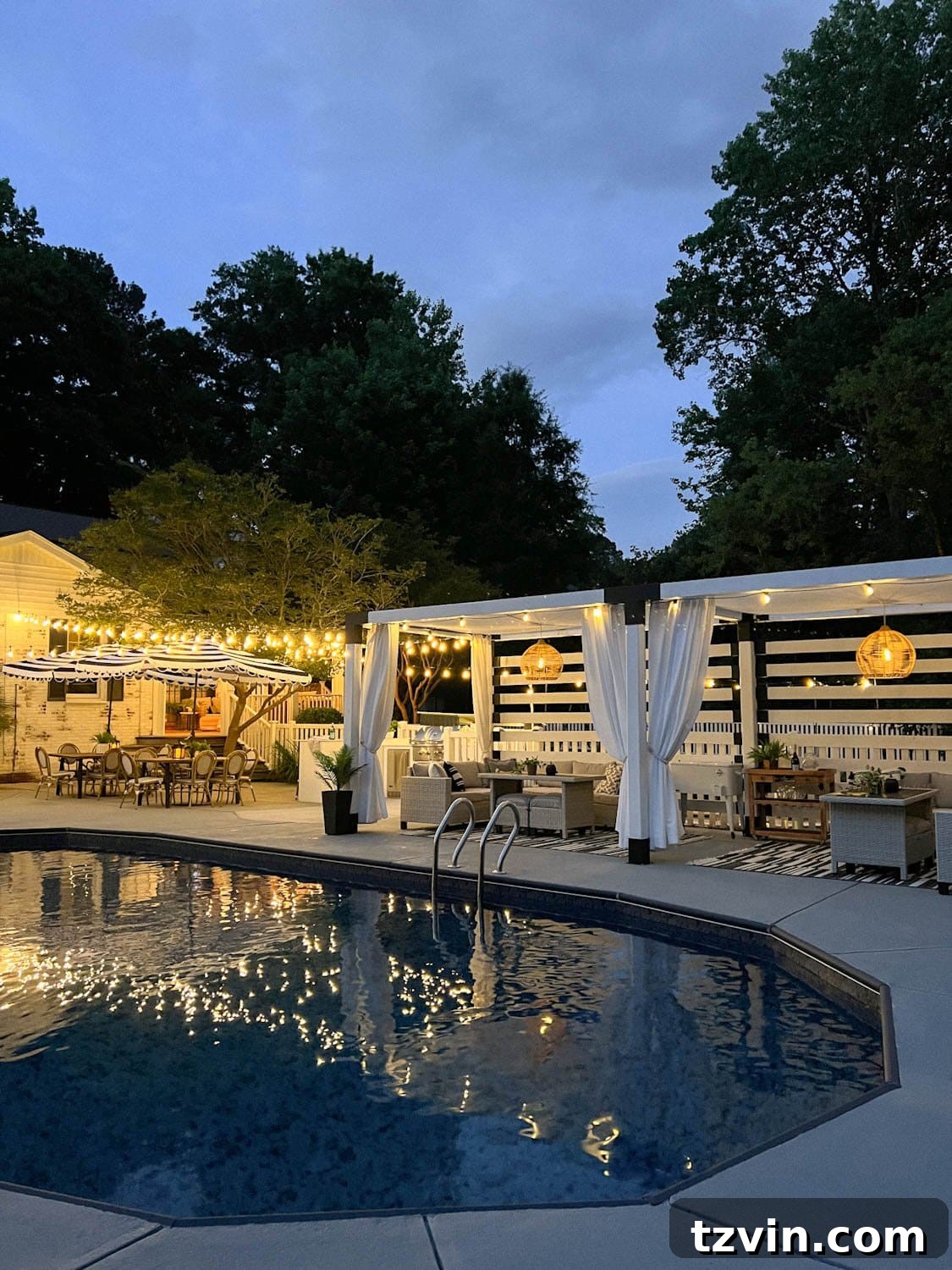 Illuminate Your Nights: Simple DIY Backyard Lighting Projects 2 backyard pool with pergola cabana, outdoor curtains, and enchanting backyard lighting