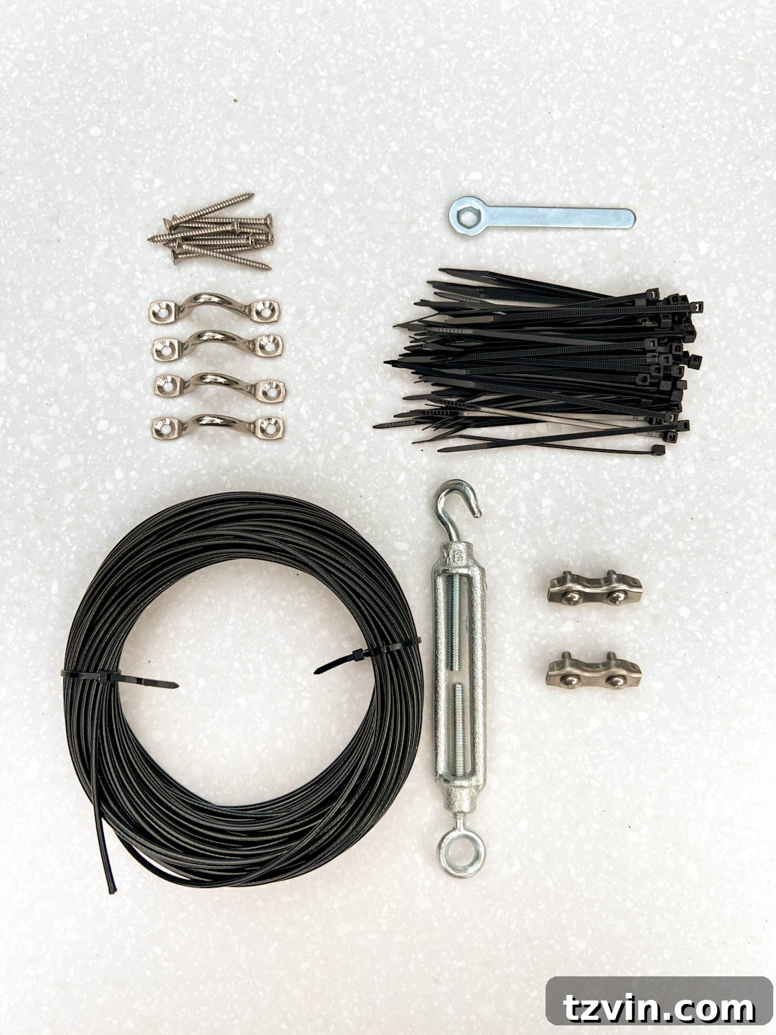 Creative String Light Solutions for Every Backyard Corner 21 a light mounting kit with a cable, zip ties, and hardware