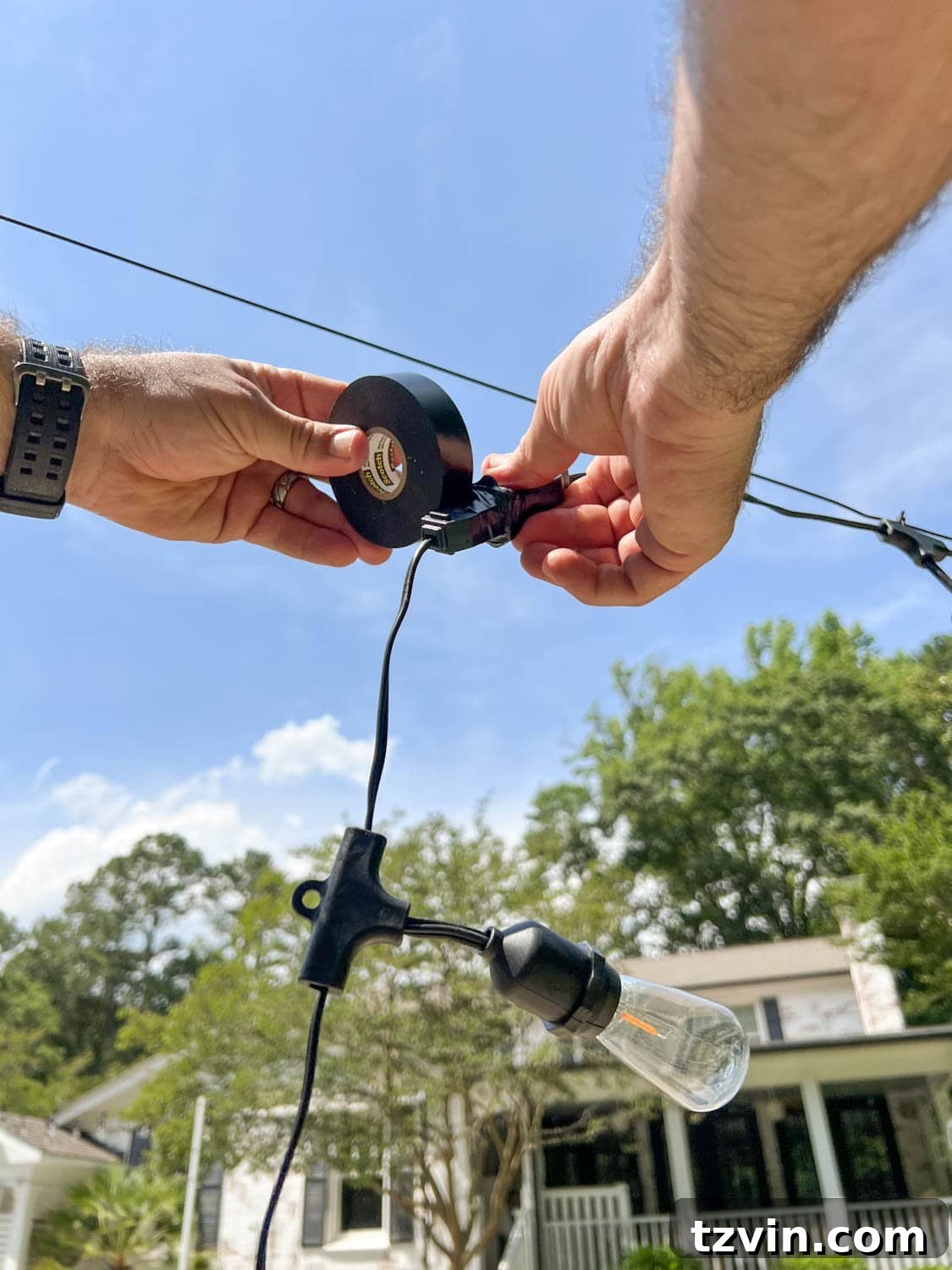 Creative String Light Solutions for Every Backyard Corner 27 wrapping two string light strand plugs with black electrical tape