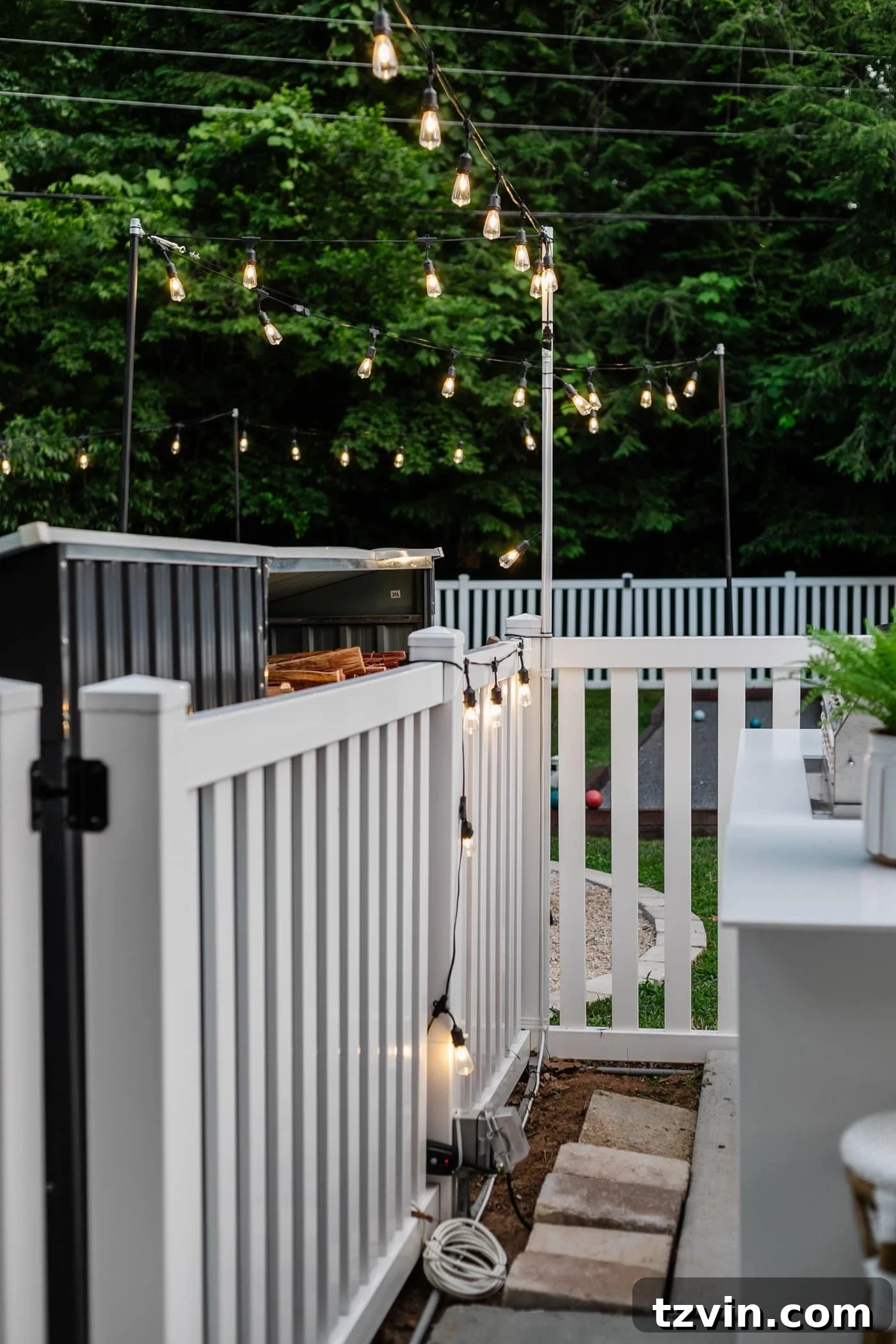 Creative String Light Solutions for Every Backyard Corner 7 plug in outdoor lights with an outlet, outdoor extension cord, and outdoor timer