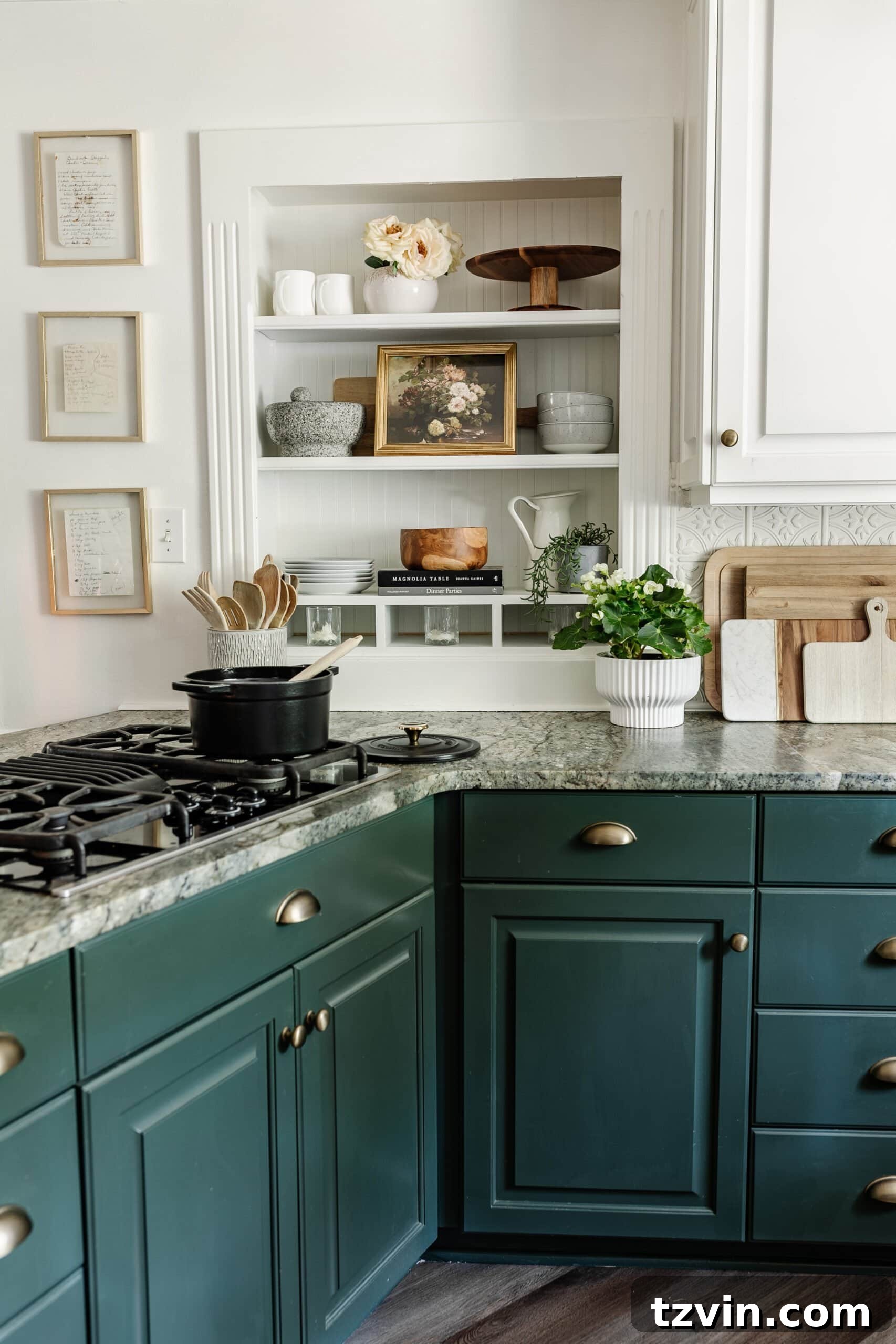 Kitchen and Nook Amazing Makeover 26 Beautifully decorated kitchen shelves, featuring framed recipe art and charming accessories, adding a personal touch to the culinary space.