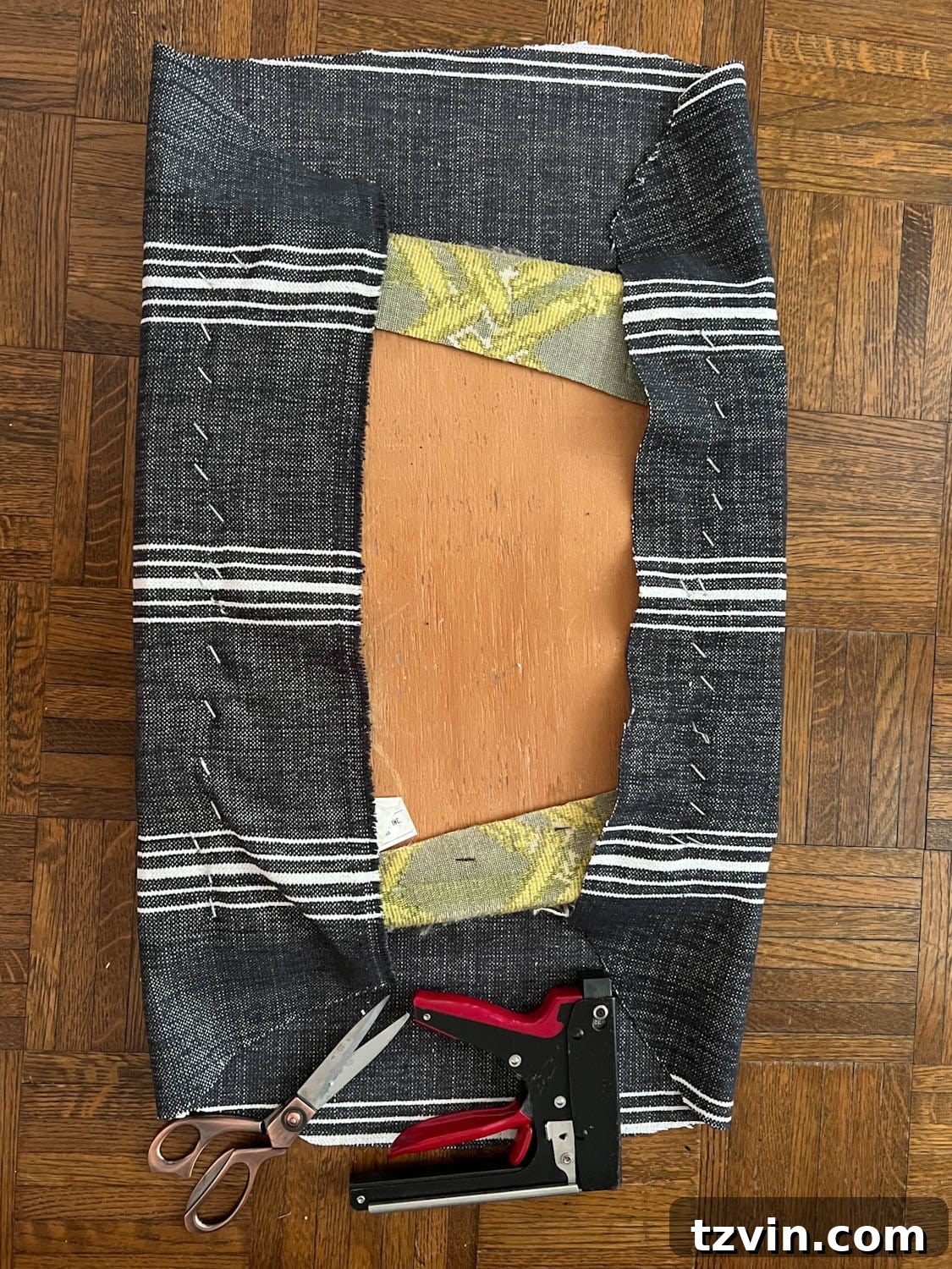 Revitalize Your Dining Chairs Seat Reupholstery and Faux Bamboo Transformation 5 two sides of reupholstering dining chair seat using a staple gun
