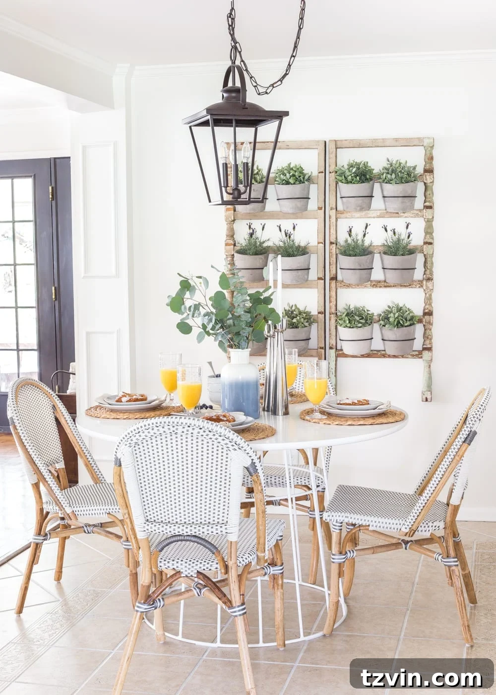 Chic Parisian Morning Retreat 19 Modern rustic breakfast nook design with a clean white Scandinavian table, elegant French bistro chairs, and a stylish wall planter