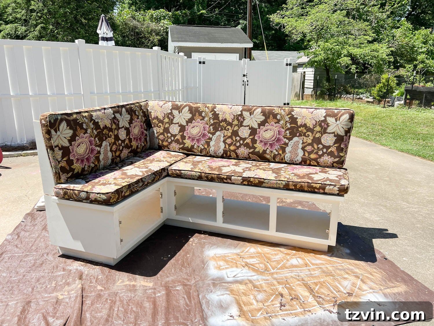 Chic Parisian Morning Retreat 6 Before shot of the white thrifted banquette bench with its original floral upholstered cushions
