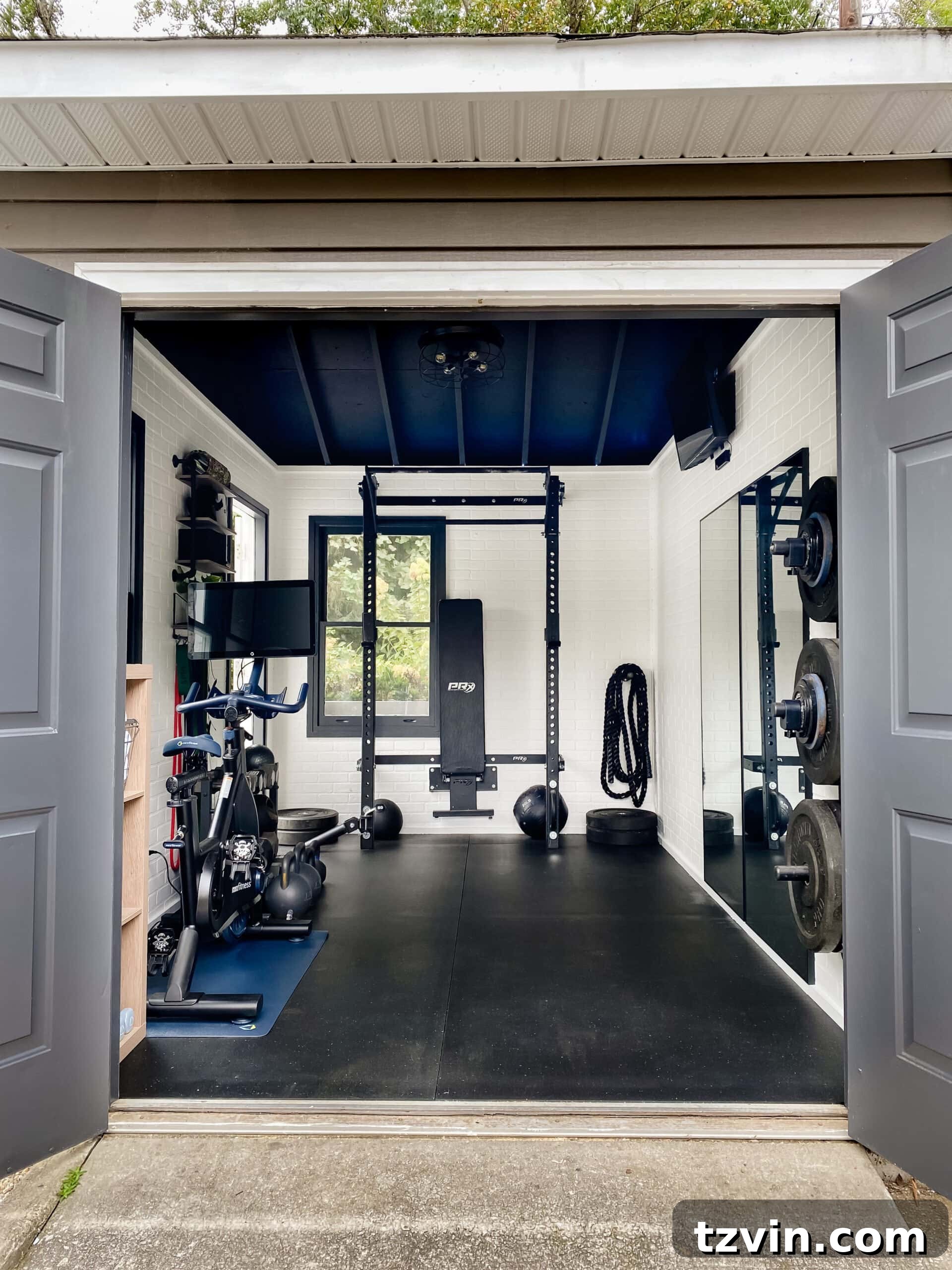 A functional backyard shed transformed into a home gym, featuring durable rubber floors, faux brick walls, and ample workout space, designed for effective at-home fitness.
