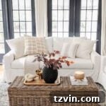 Seasonal Pillows: Beyond Autumn 12 Fall pillows a couch in a living room with fall leaves in a vase on a woven coffee table