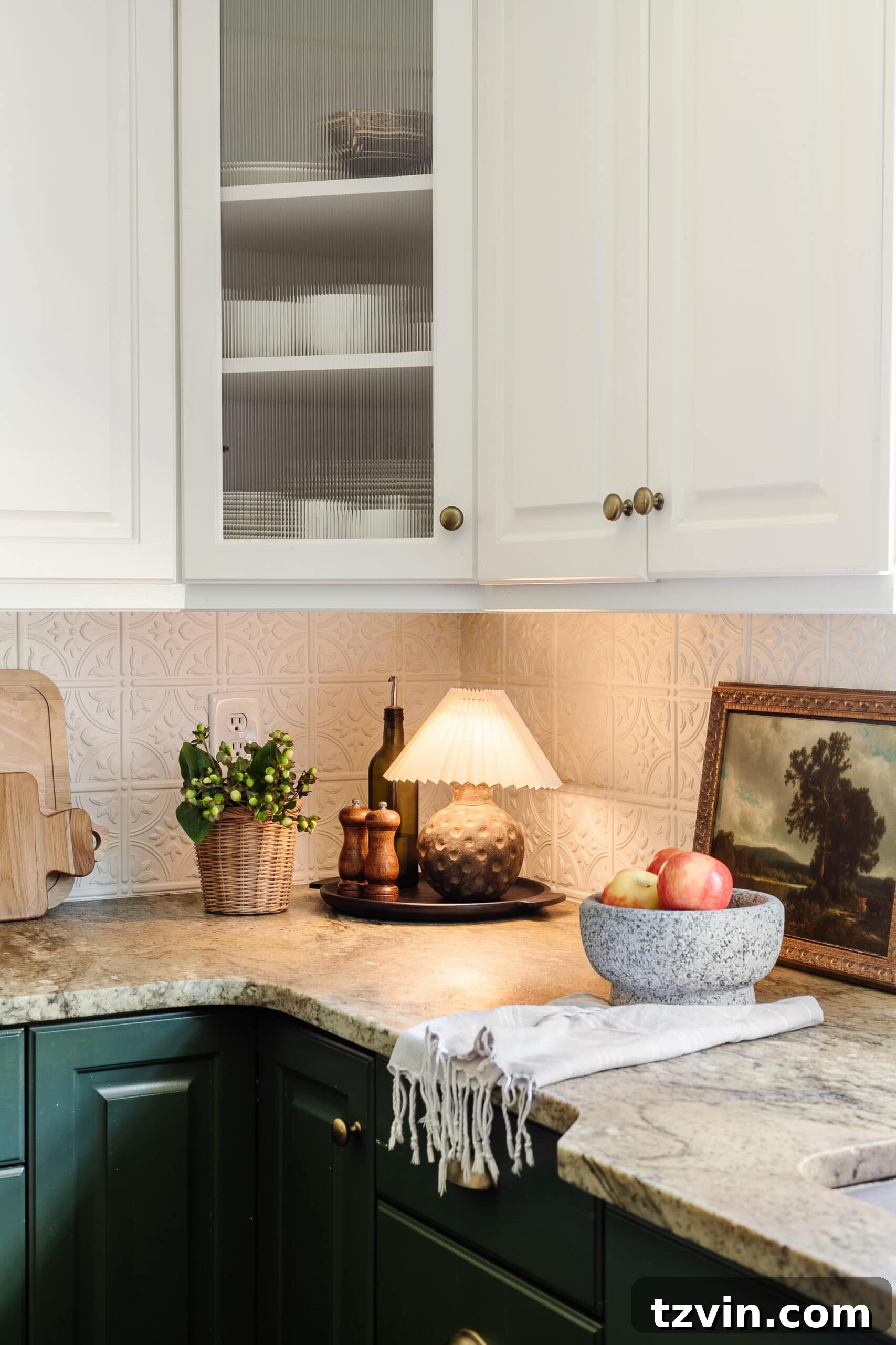 A charming cordless DIY mini lamp showcasing its versatility, perfectly accenting a kitchen corner with a bowl of apples, framed art, and a small planter.