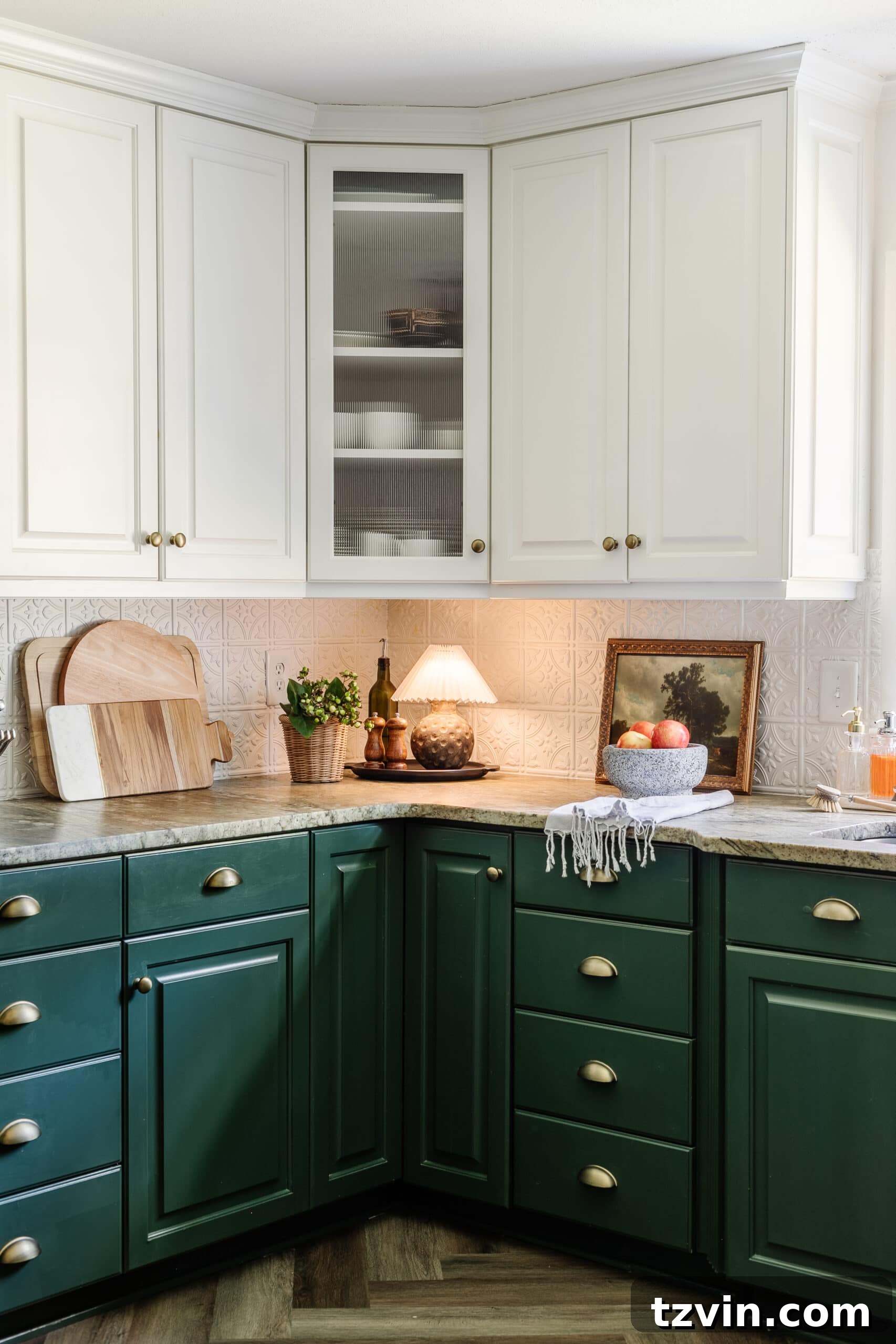 A beautifully composed shot of the cordless DIY mini lamp, casting a soft glow on a kitchen countertop, surrounded by curated decor items like a fruit bowl and artwork.