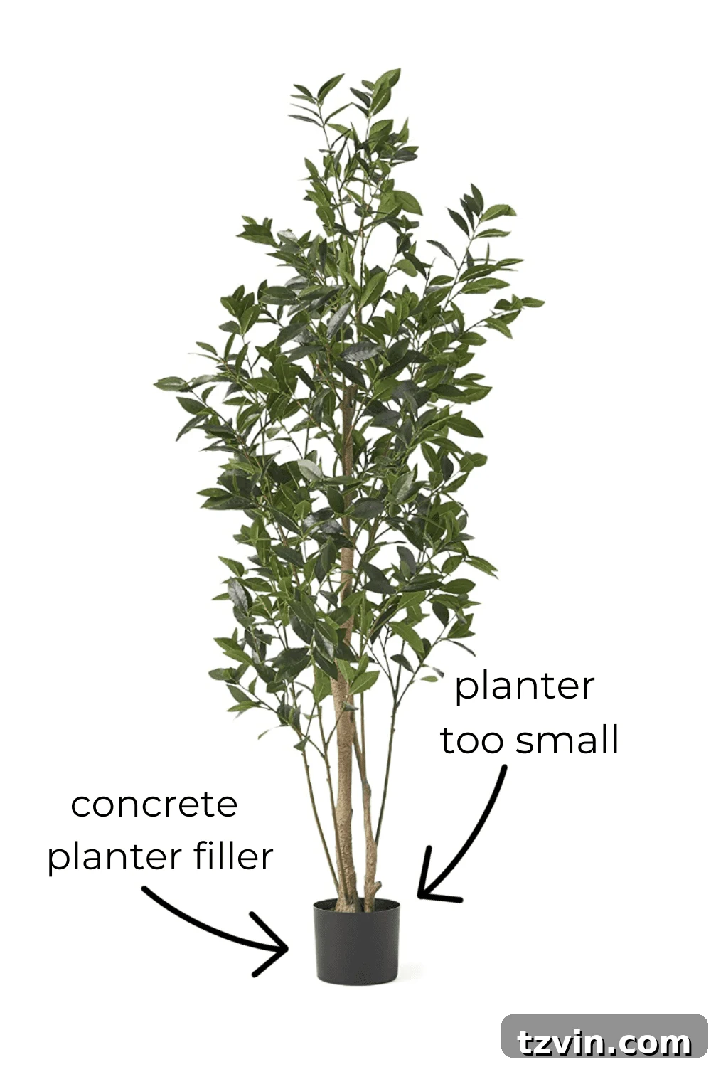 The Art of Creating Realistic Faux Trees 3 Faux tree with its cheap, visible plastic base exposed, highlighting a common styling mistake