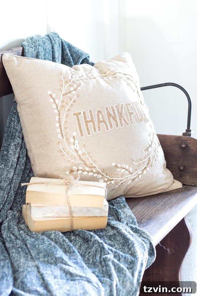Effortless Autumn Living Room Decor for Less 12 Fall pillow with Thankful and beaded wreath