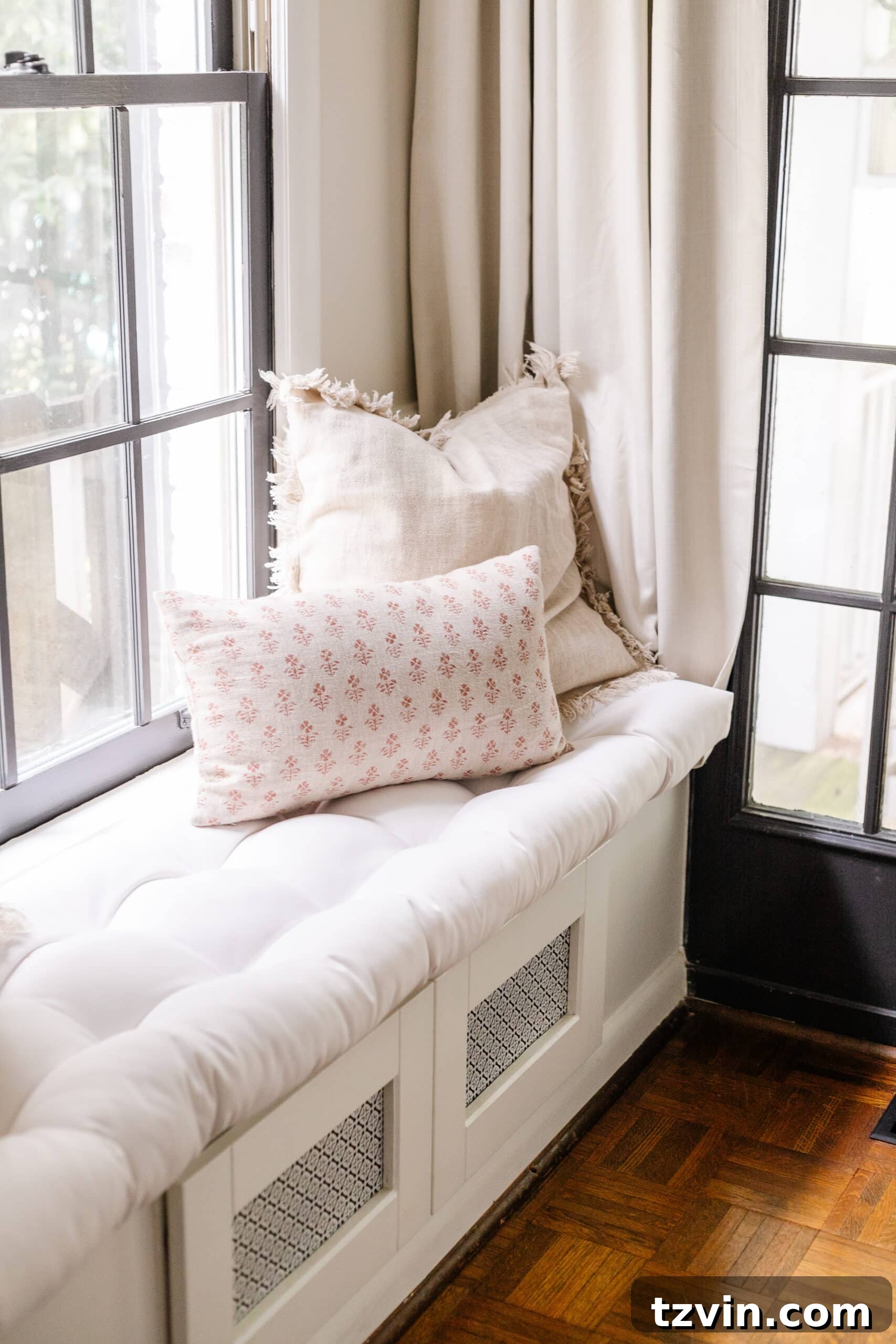 Effortless Autumn Living Room Decor for Less 13 Window seat in a living room with neutral fall pillows