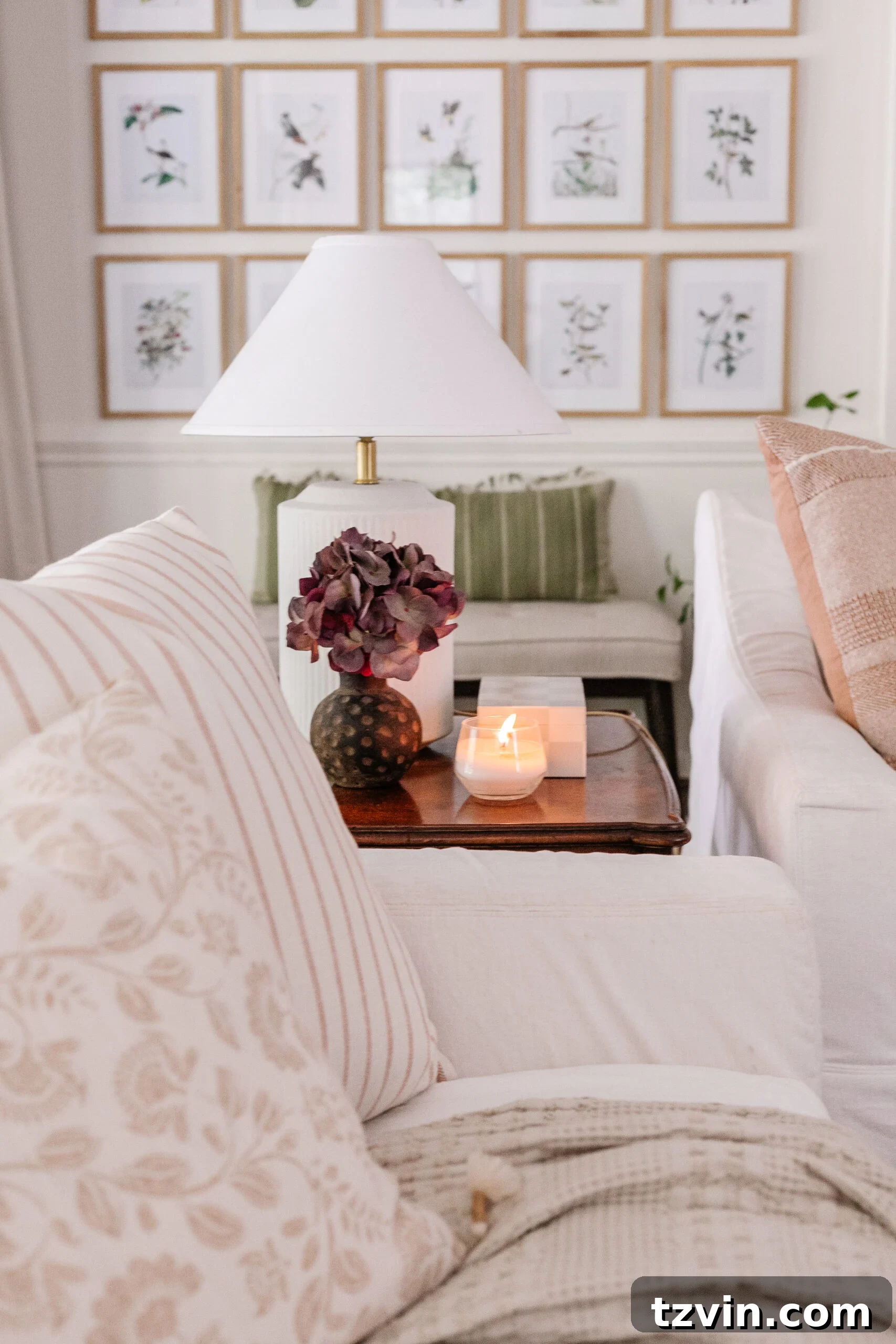 Effortless Autumn Living Room Decor for Less 19 Fall living room decor ideas on an end table with vase of fall hydrangea and candle