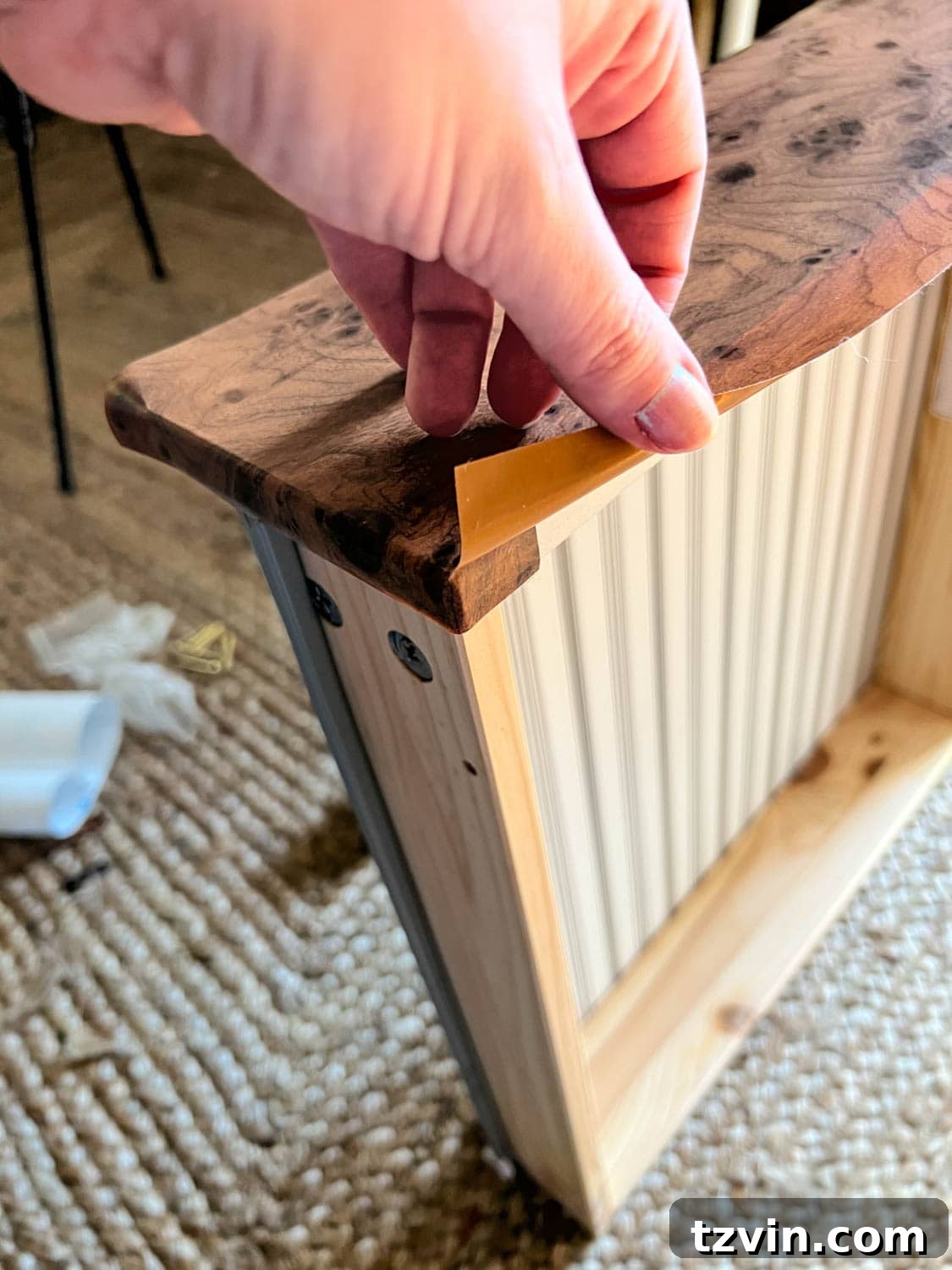 wrapping a dresser drawer with burl wood contact paper