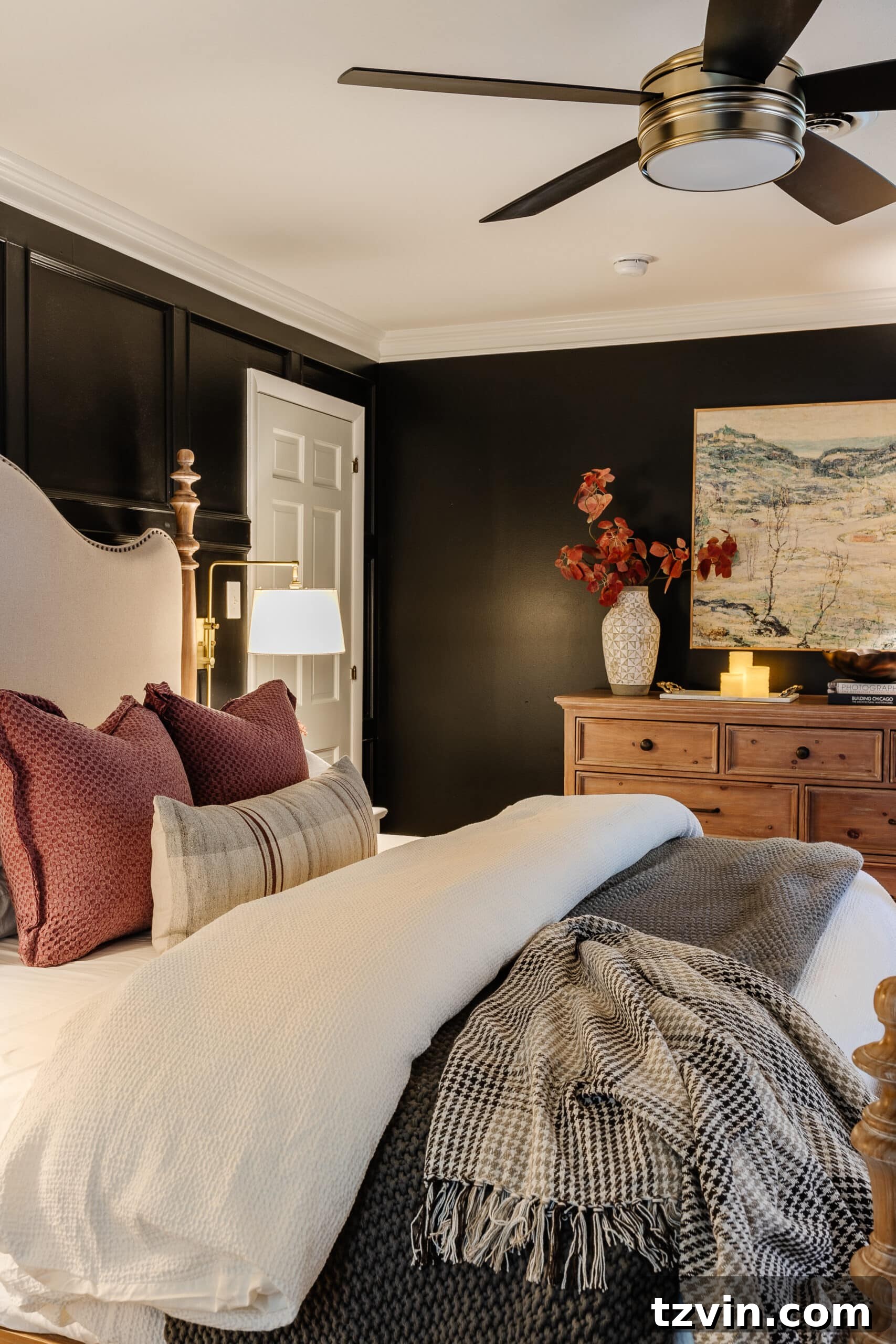 10 Budget-Friendly Ways to Create a Cozy Sleep Haven 6 cozy bedroom with lamps, candles, art, and fall decor