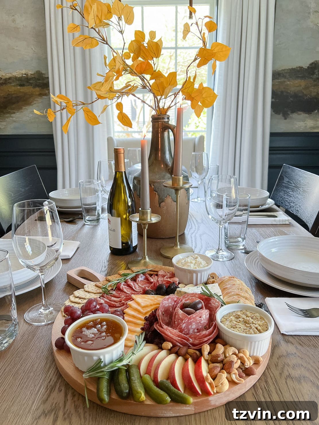 10-Minute Charcuterie Board Hack 2 A beautifully arranged DIY charcuterie board set for six guests on a rustic dinner table, ready for a fall gathering.