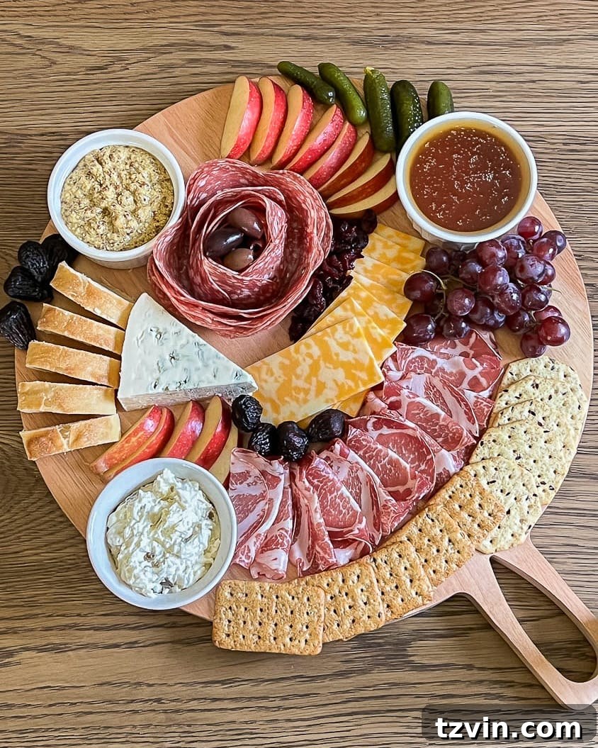 simple charcuterie board with savory ingredients added