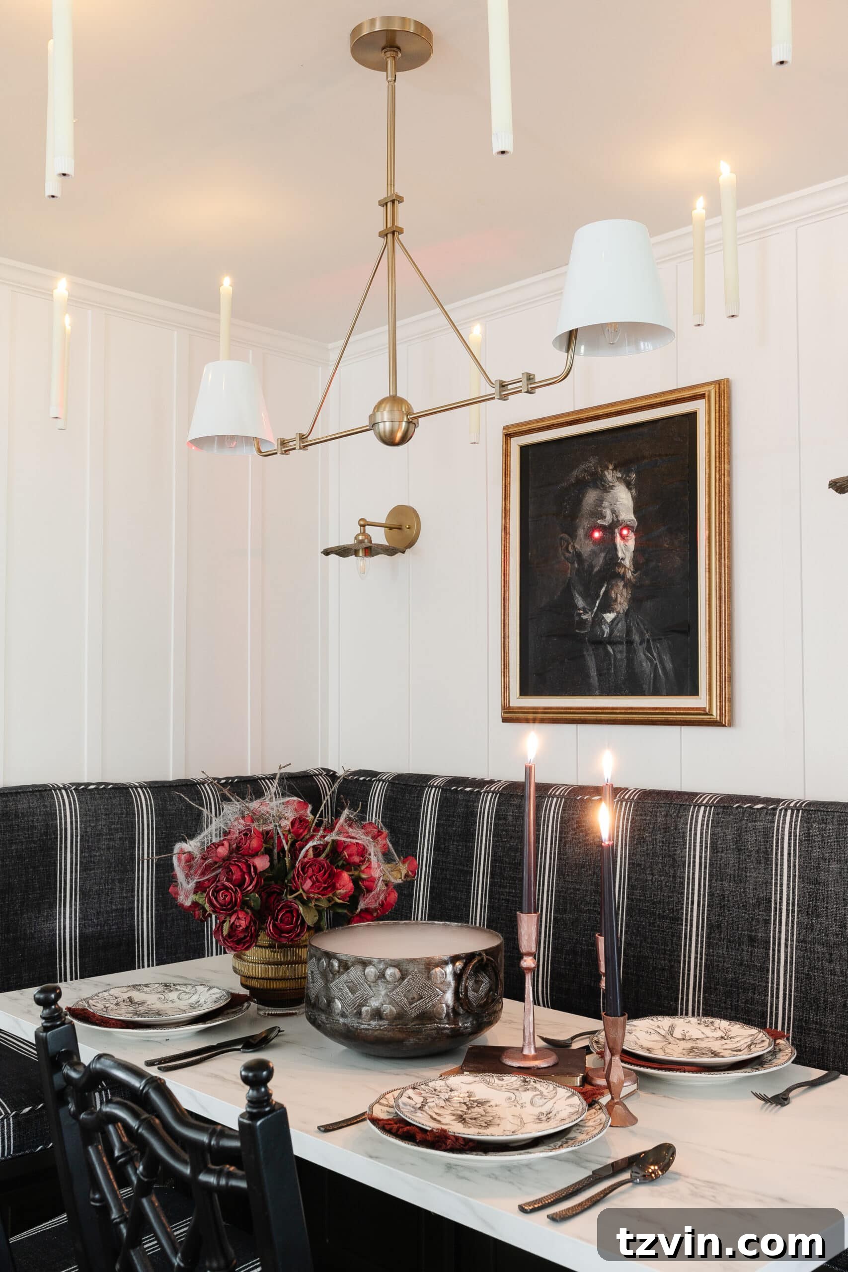 Killer Tablescapes: Spooky Settings for Your Murder Mystery Party 11 Halloween table decor for a gothic chic dinner party, featuring elegant place settings and atmospheric lighting