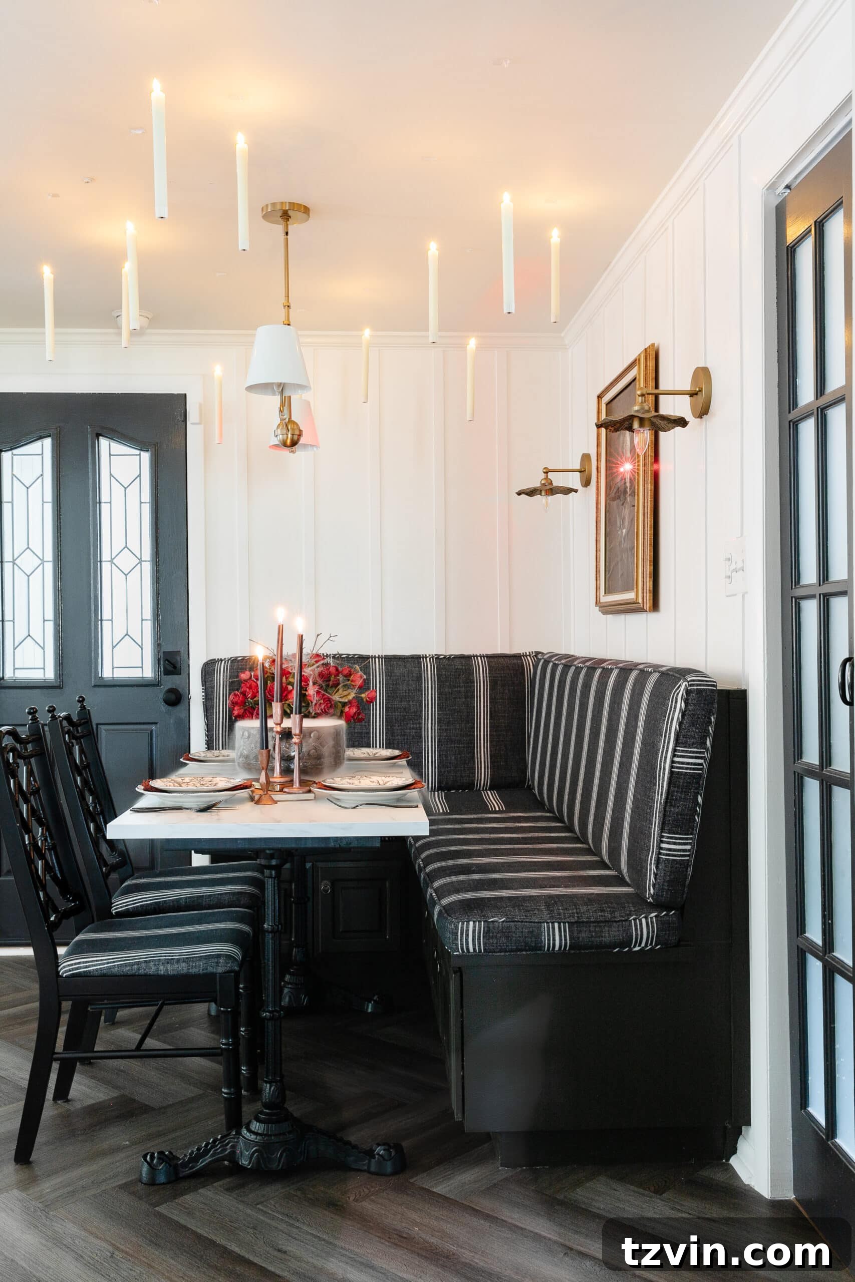 Killer Tablescapes: Spooky Settings for Your Murder Mystery Party 16 Murder mystery dinner party banquette nook with enchanting floating candles and elegant decor