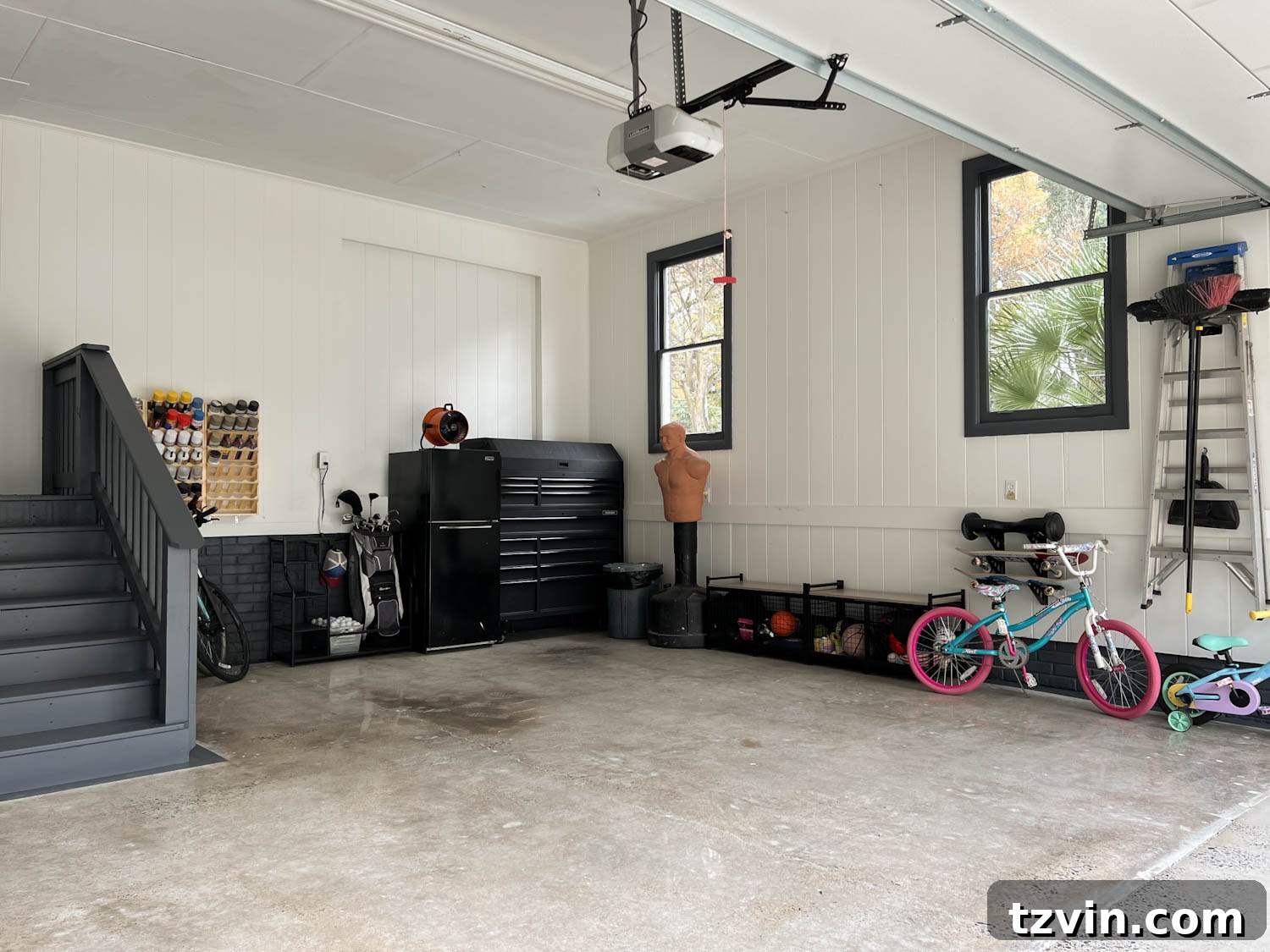 The garage after its makeover, with a dedicated area for sporting goods and efficient storage solutions.