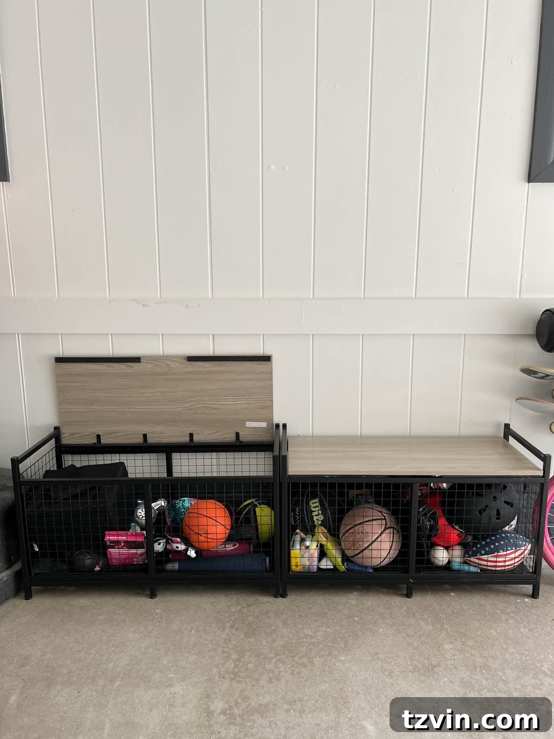 Heavy-duty storage benches in a garage, used for storing sporting equipment and providing seating.