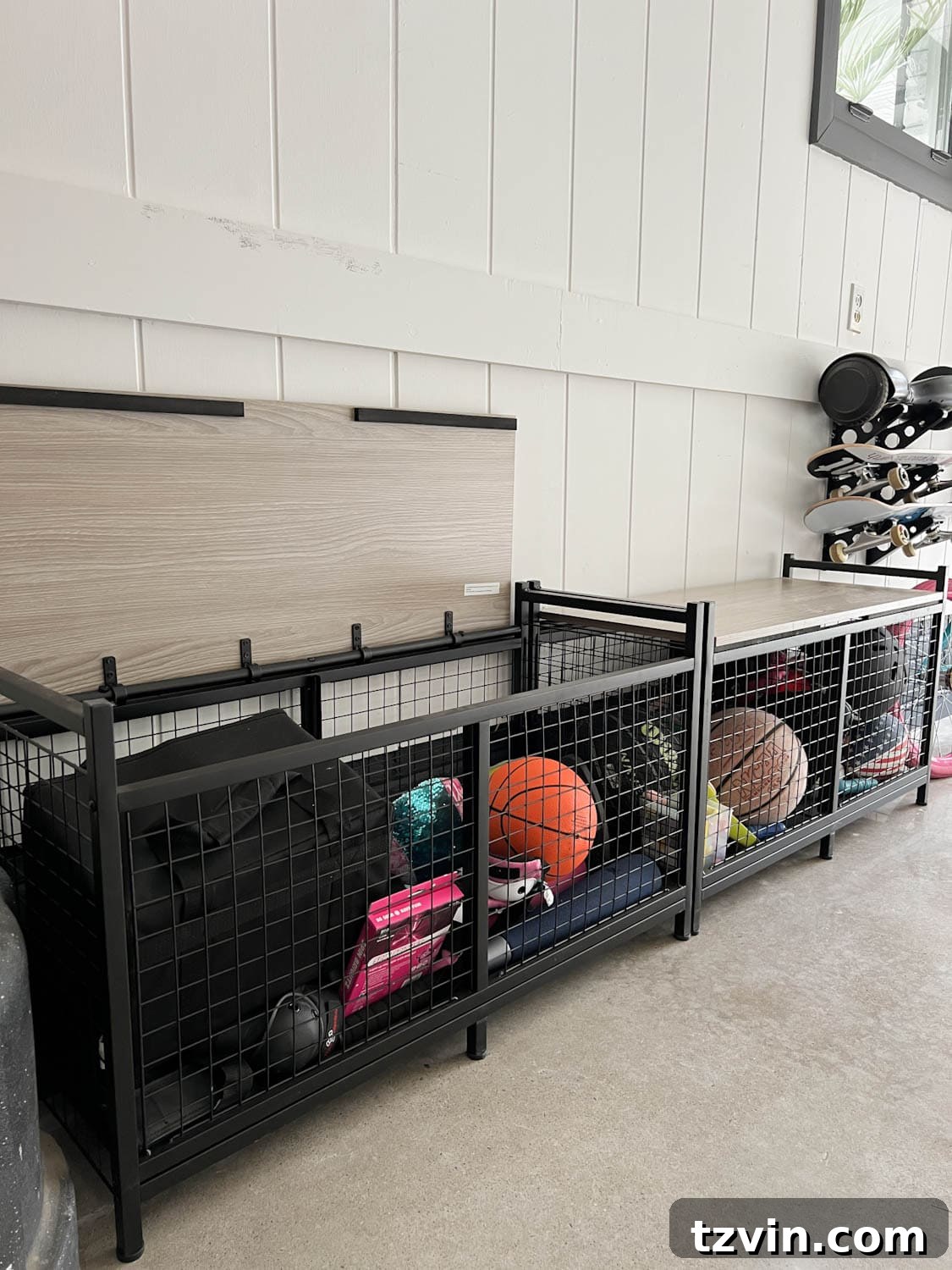 Close-up of heavy-duty benches functioning as effective storage for sporting equipment in a garage.