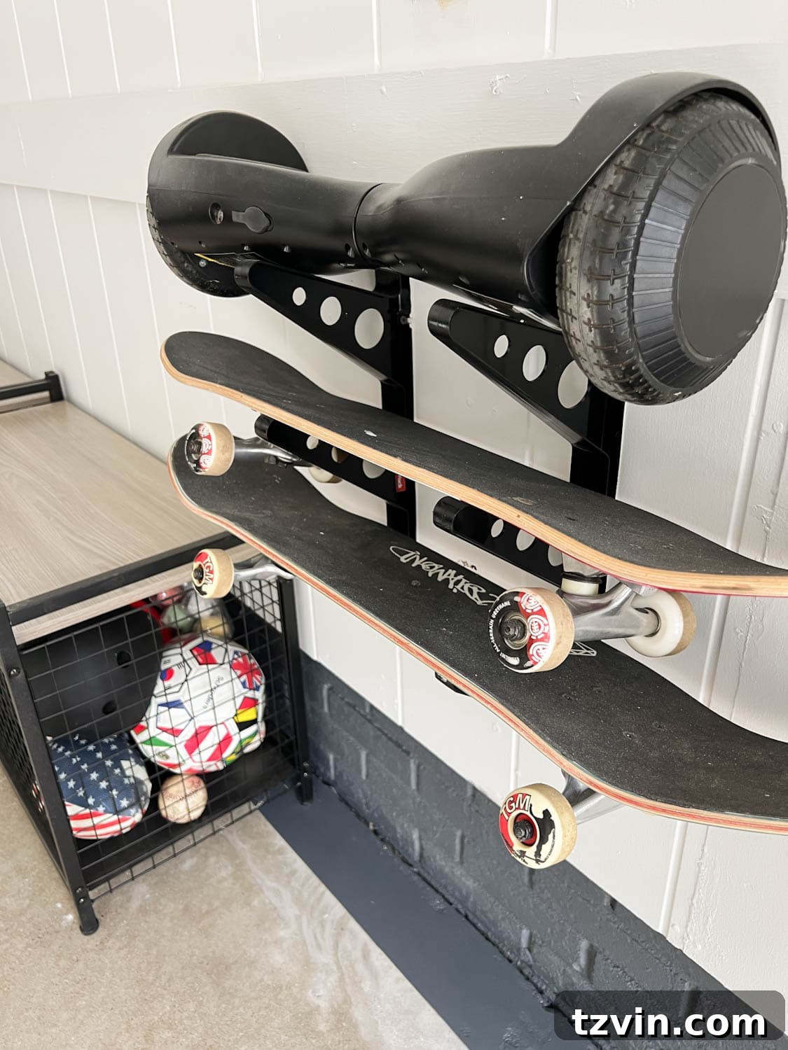 A wall-mounted skateboard rack in a garage, keeping skateboards off the floor and organized.