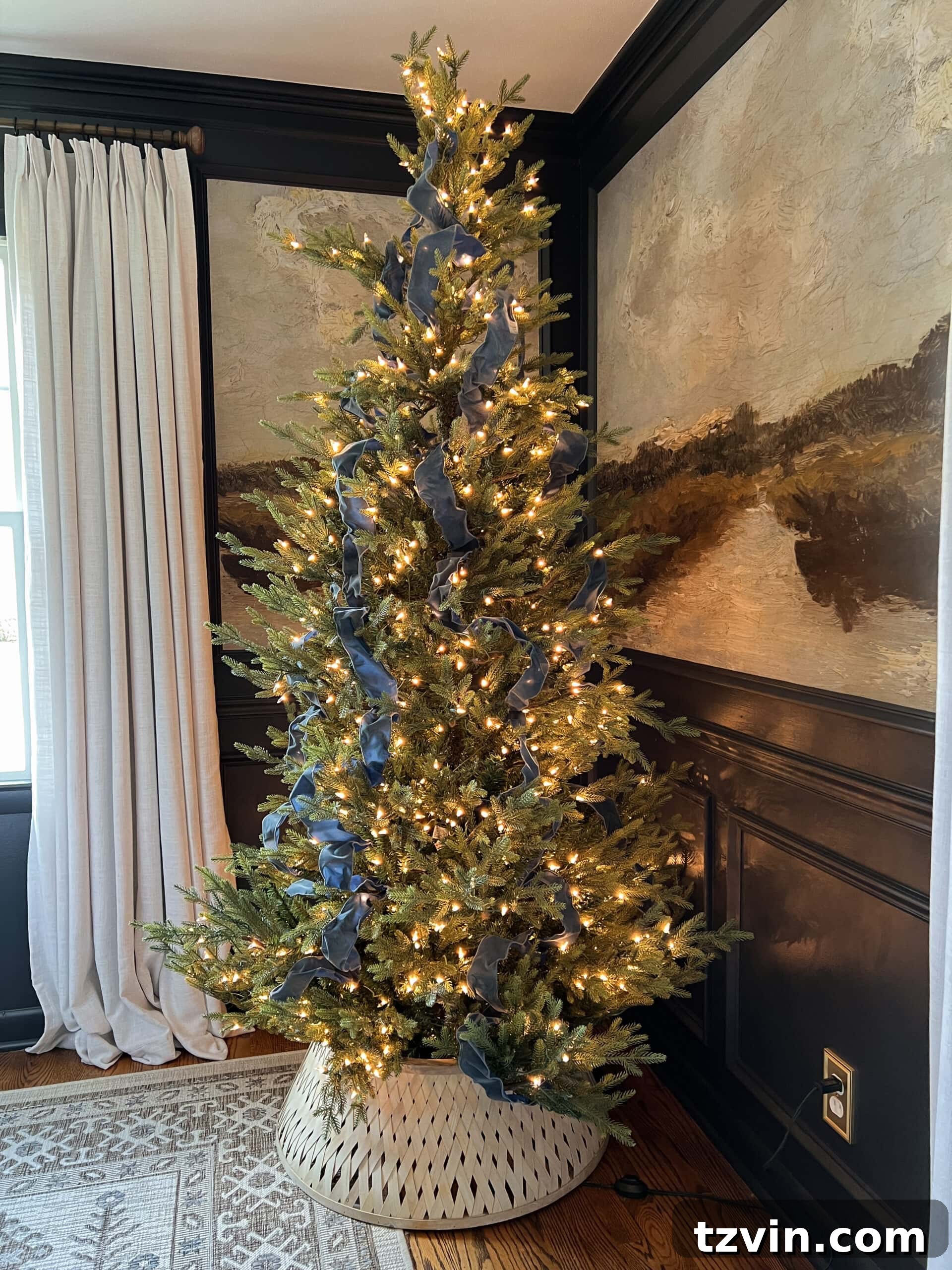 Christmas tree decorated with antique blue ribbon