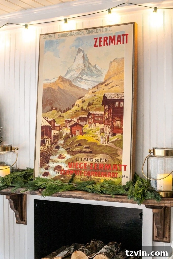 Christmas art created by covering old art on a canvas with a beautiful poster depicting a mountain scene