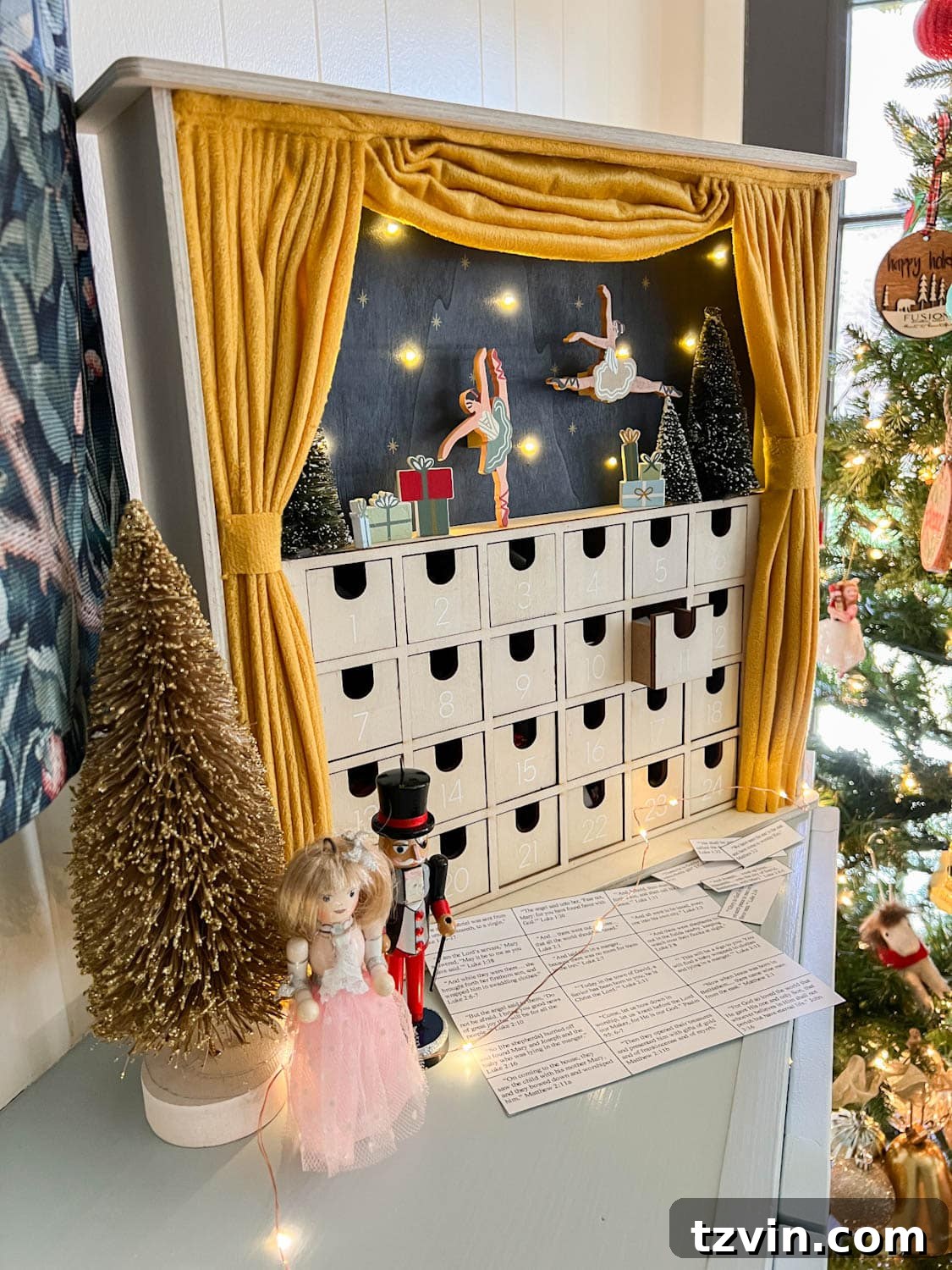 Printable Advent Journey: A Christmas Story Scripture Countdown 6 A beautifully arranged Advent display featuring Advent Bible verse scripture cards and a ballet-themed Advent calendar.