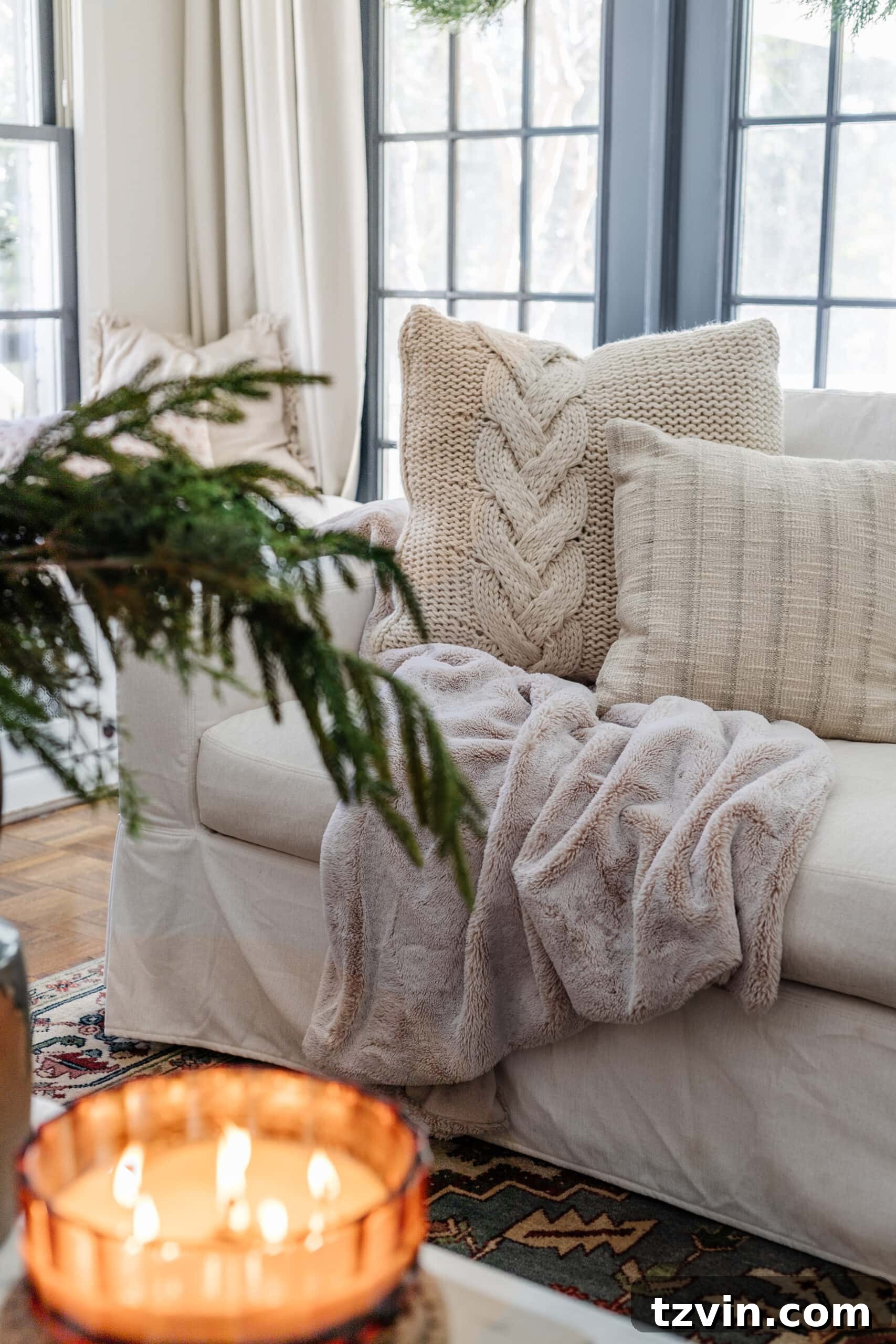 Snuggle-Worthy: 13 Christmas Living Room Decor Inspirations 6 neutral winter pillows for Christmas on couch