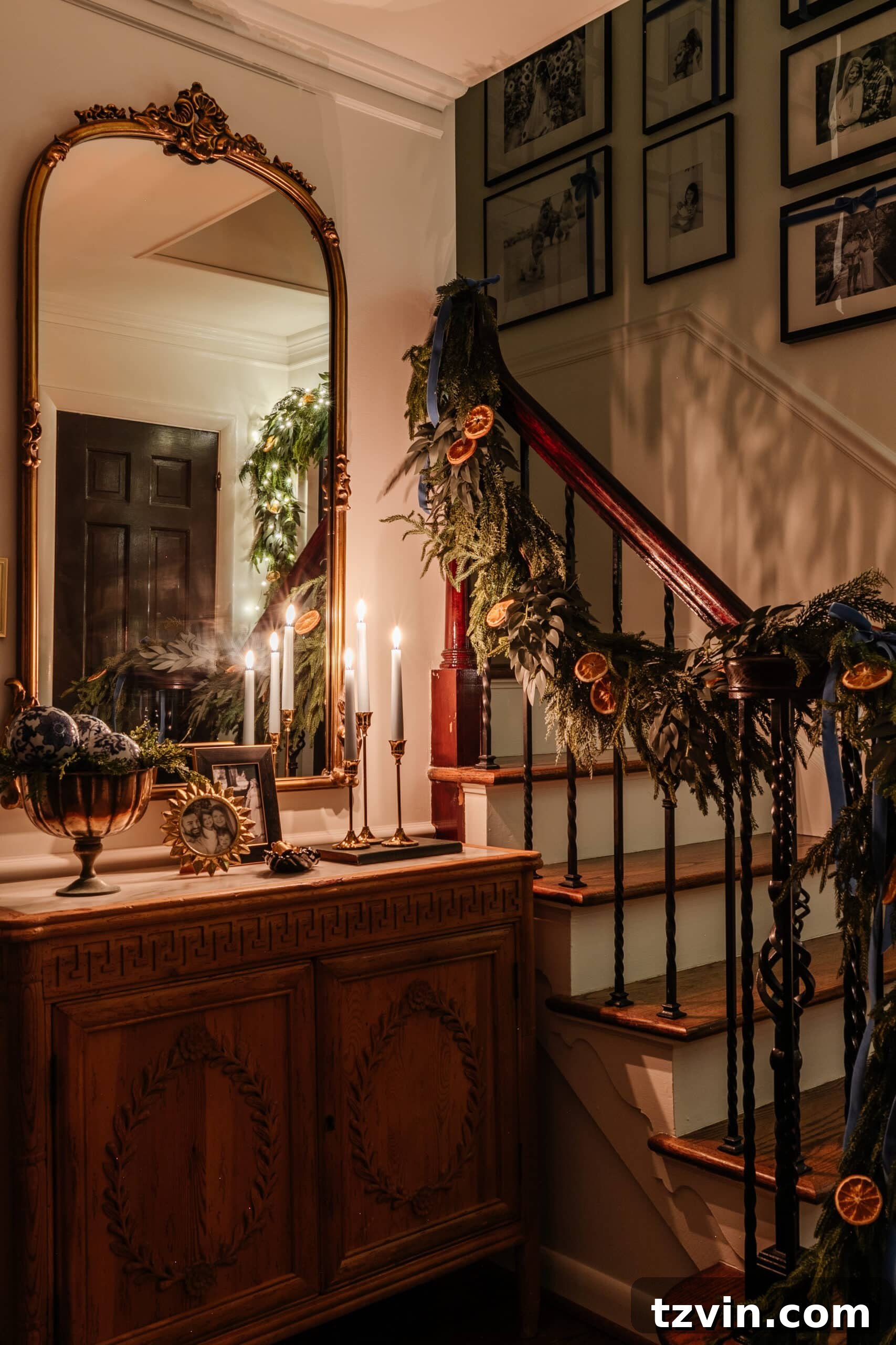 A cozy living room at night, illuminated by the warm glow of a Christmas tree and candles, showcasing effective low-light photography.