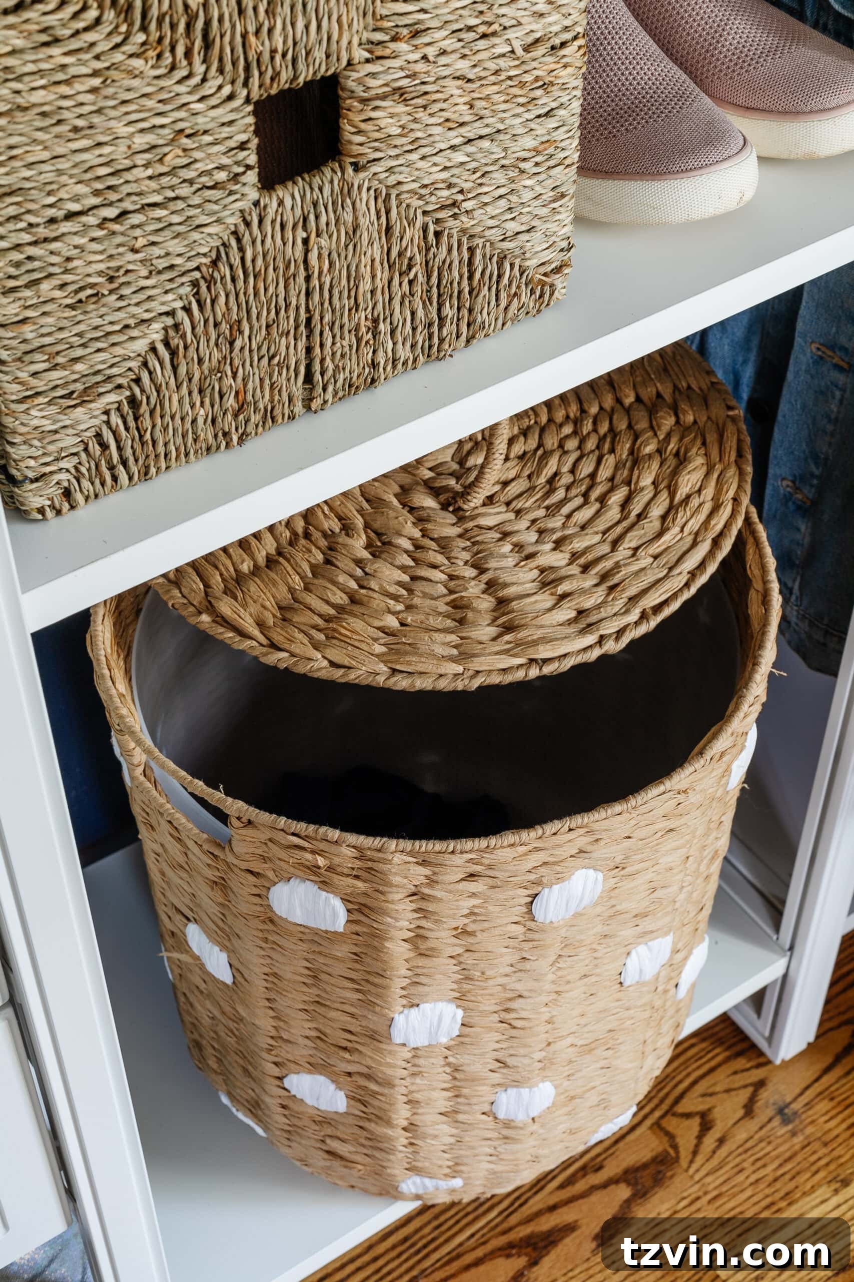 Petite Wardrobe Perfection: 10 Organizing Hacks for Girls 11 hamper stored on a shelf in a small closet for easy access and tidiness