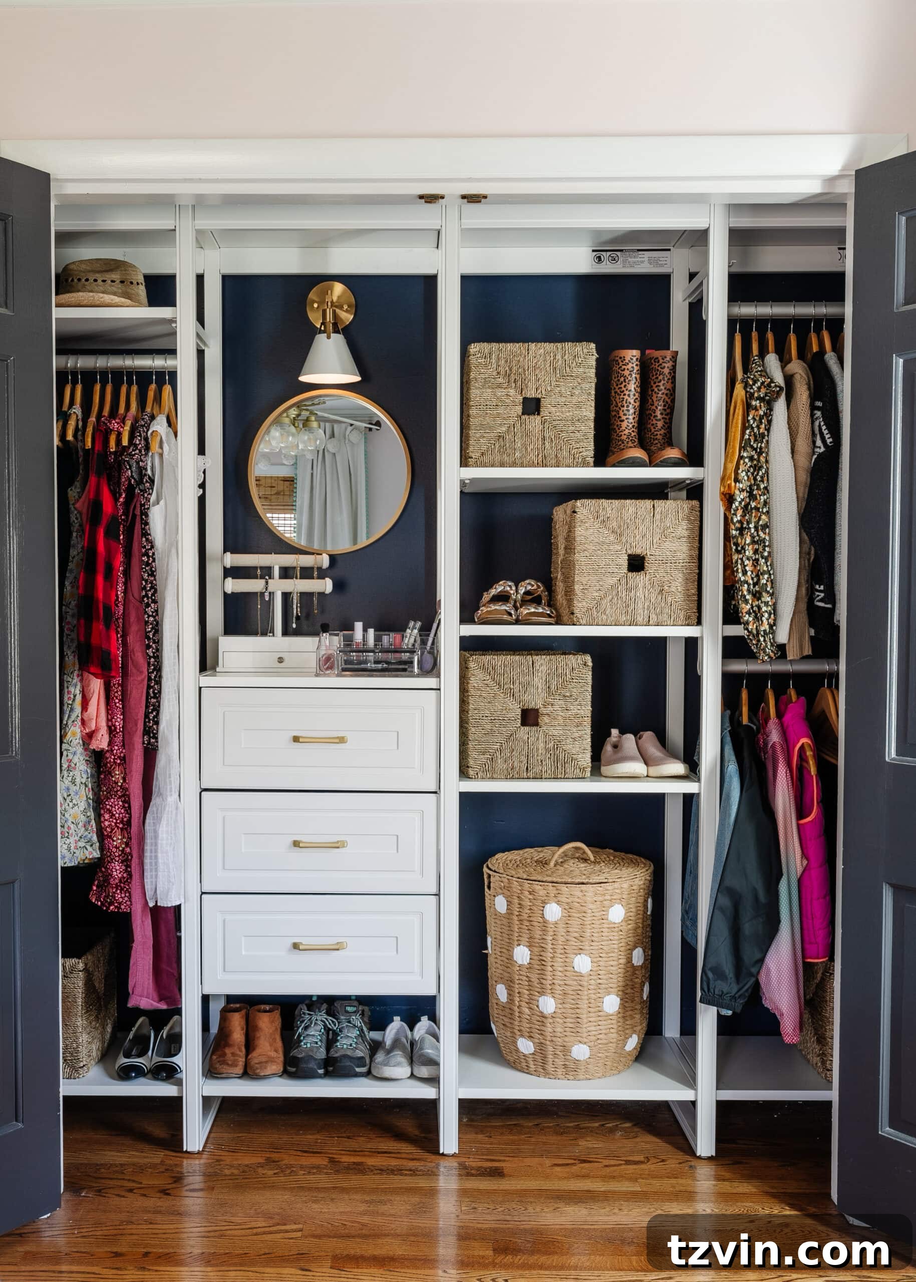 Petite Wardrobe Perfection: 10 Organizing Hacks for Girls 3 organized small closet for girls with vanity area and efficient clothing storage