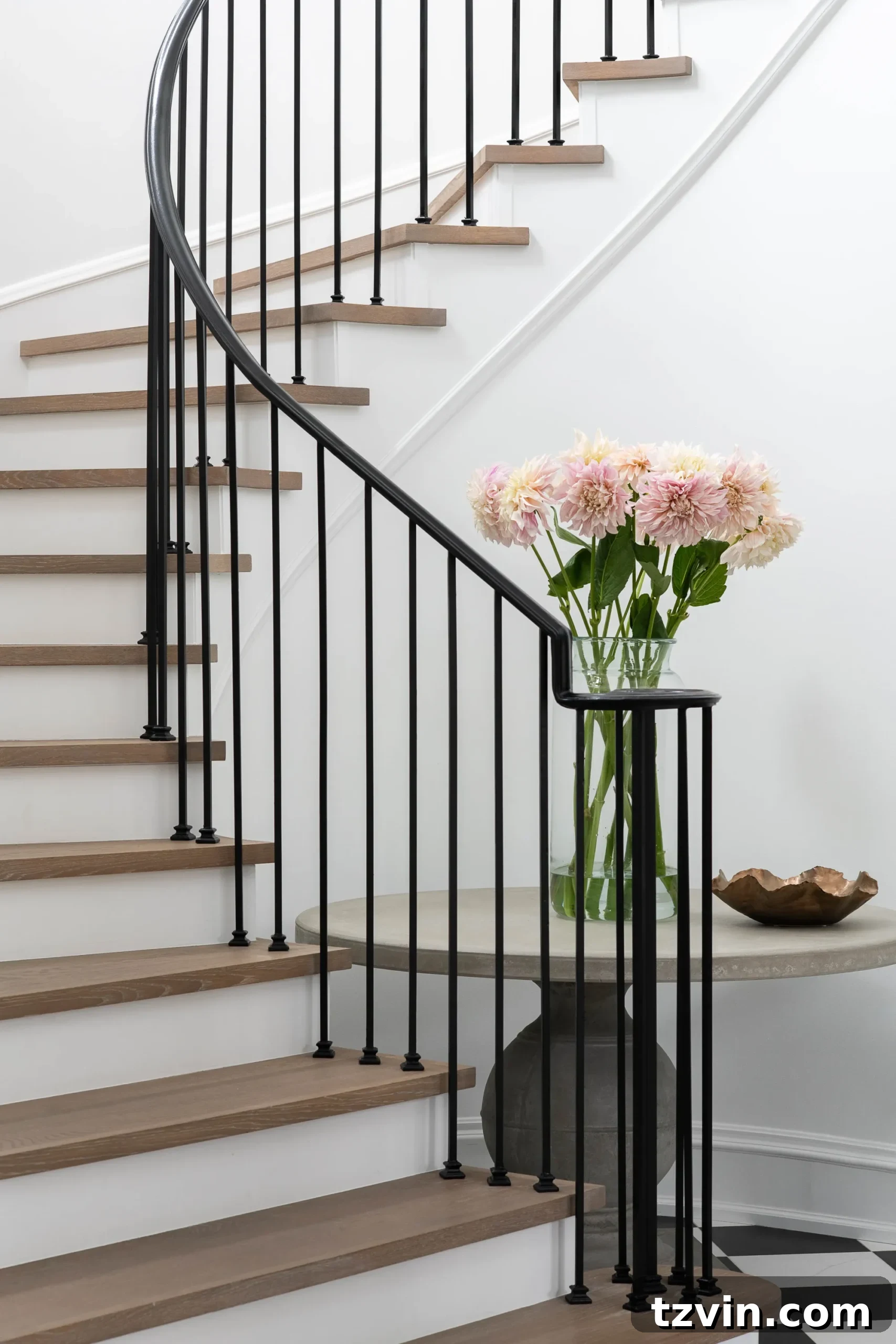 Black Stair Railing Ideas for a Dramatic Entry 8 simple black stair railing with wood treads and white risers