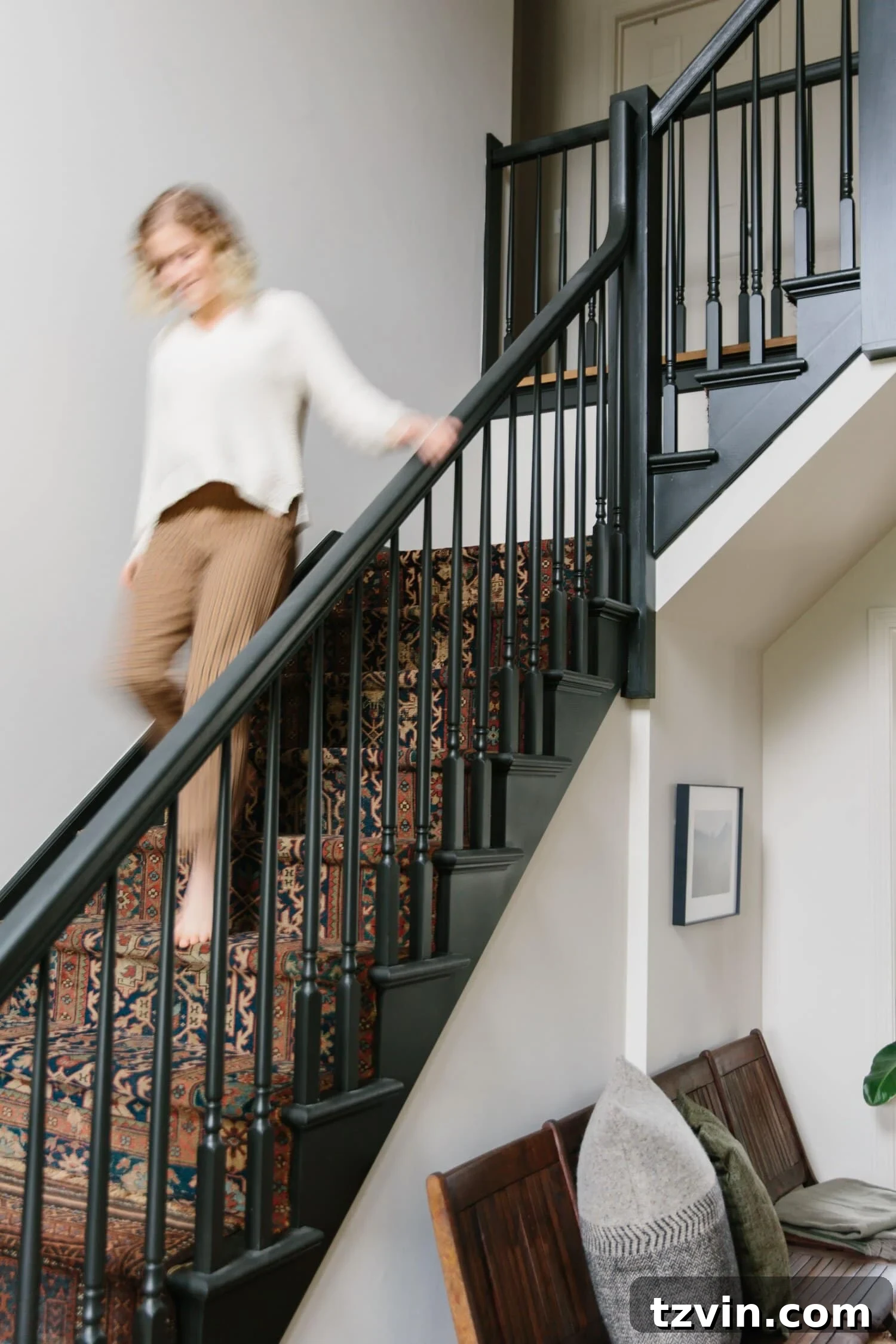 Black Stair Railing Ideas for a Dramatic Entry 10 black painted staircase with vintage rug
