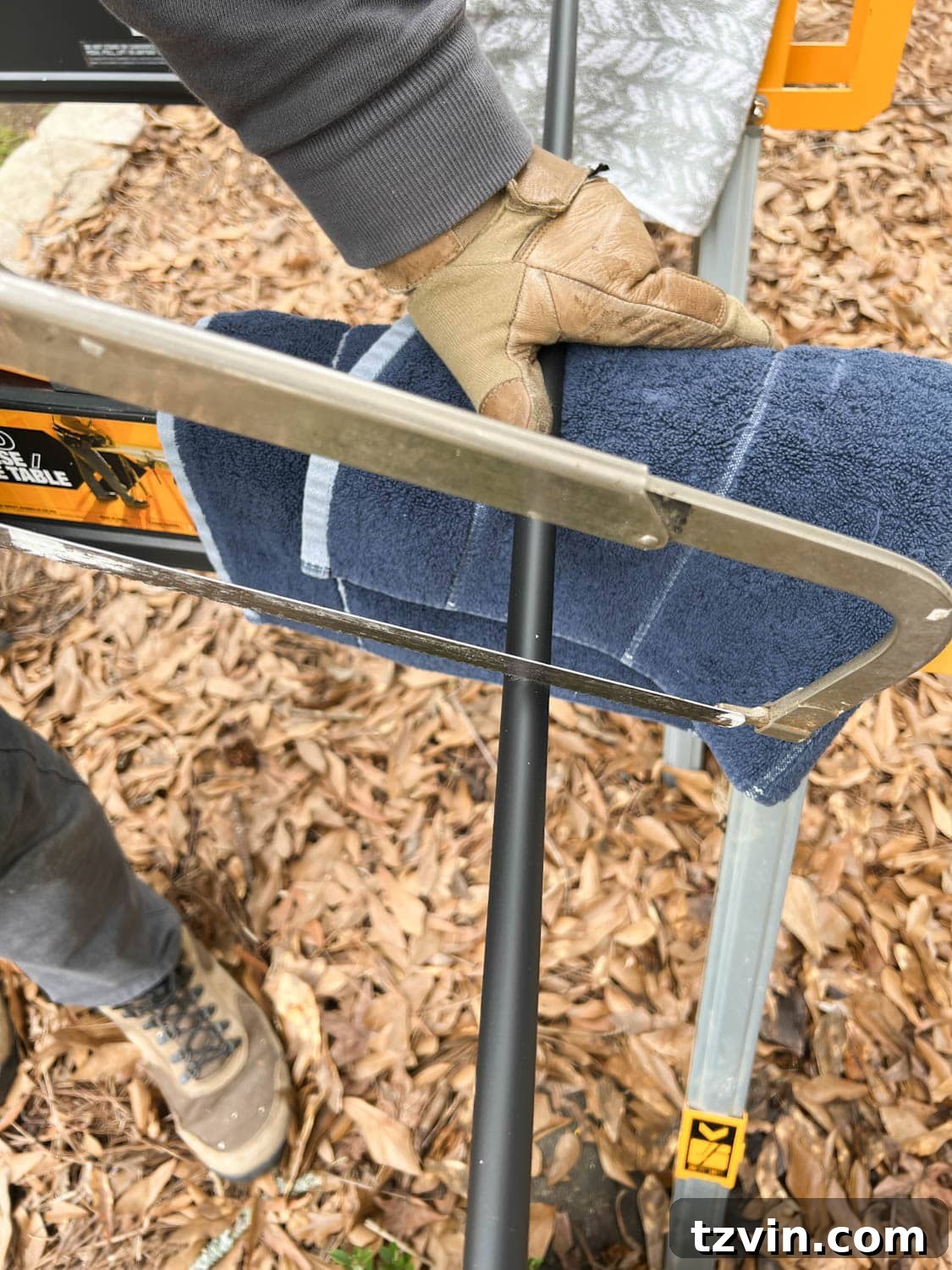 Revamp Your Stairs: DIY Spindle Replacement 14 cutting new stair balusters with a hack saw