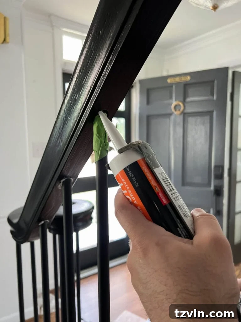 Revamp Your Stairs: DIY Spindle Replacement 27 reinforcing stair balusters with construction adhesive in railing