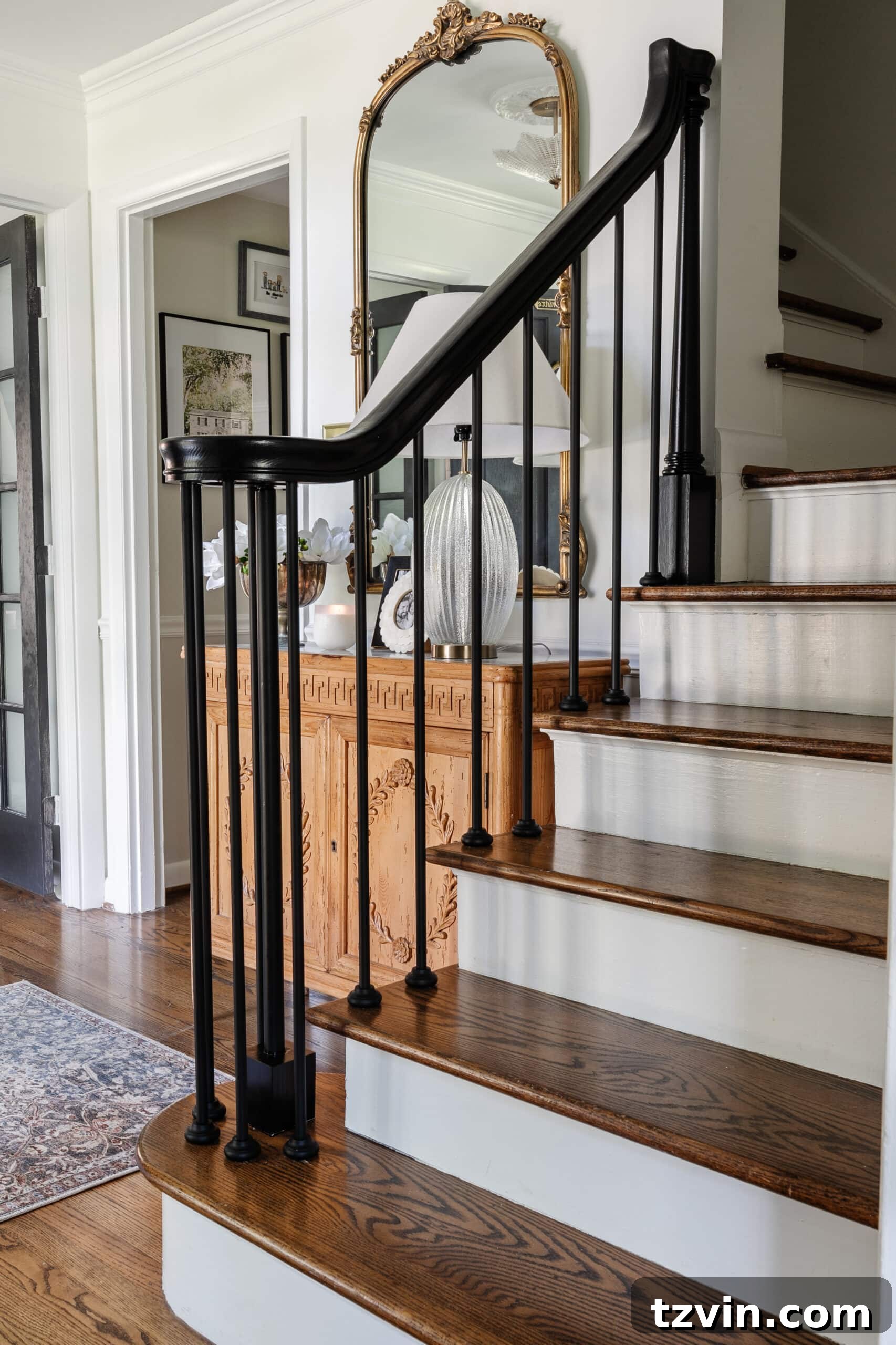 Revamp Your Stairs: DIY Spindle Replacement 5 newly replaced stair spindles on a stair railing