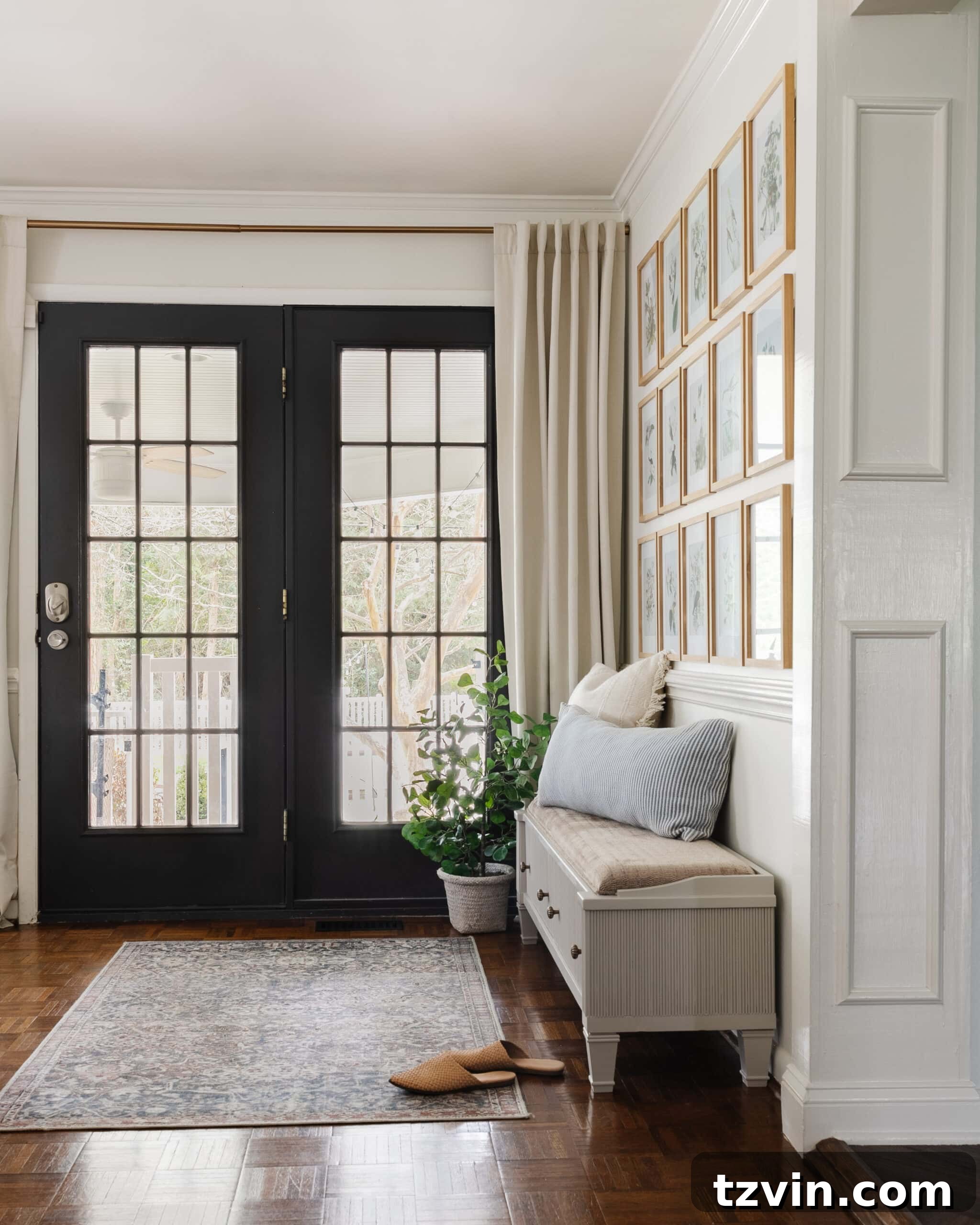 Reeded Elegance: A Shoe Storage Bench Makeover 2 Stylish reeded shoe storage bench in an entryway, flanked by elegant black doors and a captivating gallery wall, showcasing a sophisticated DIY transformation