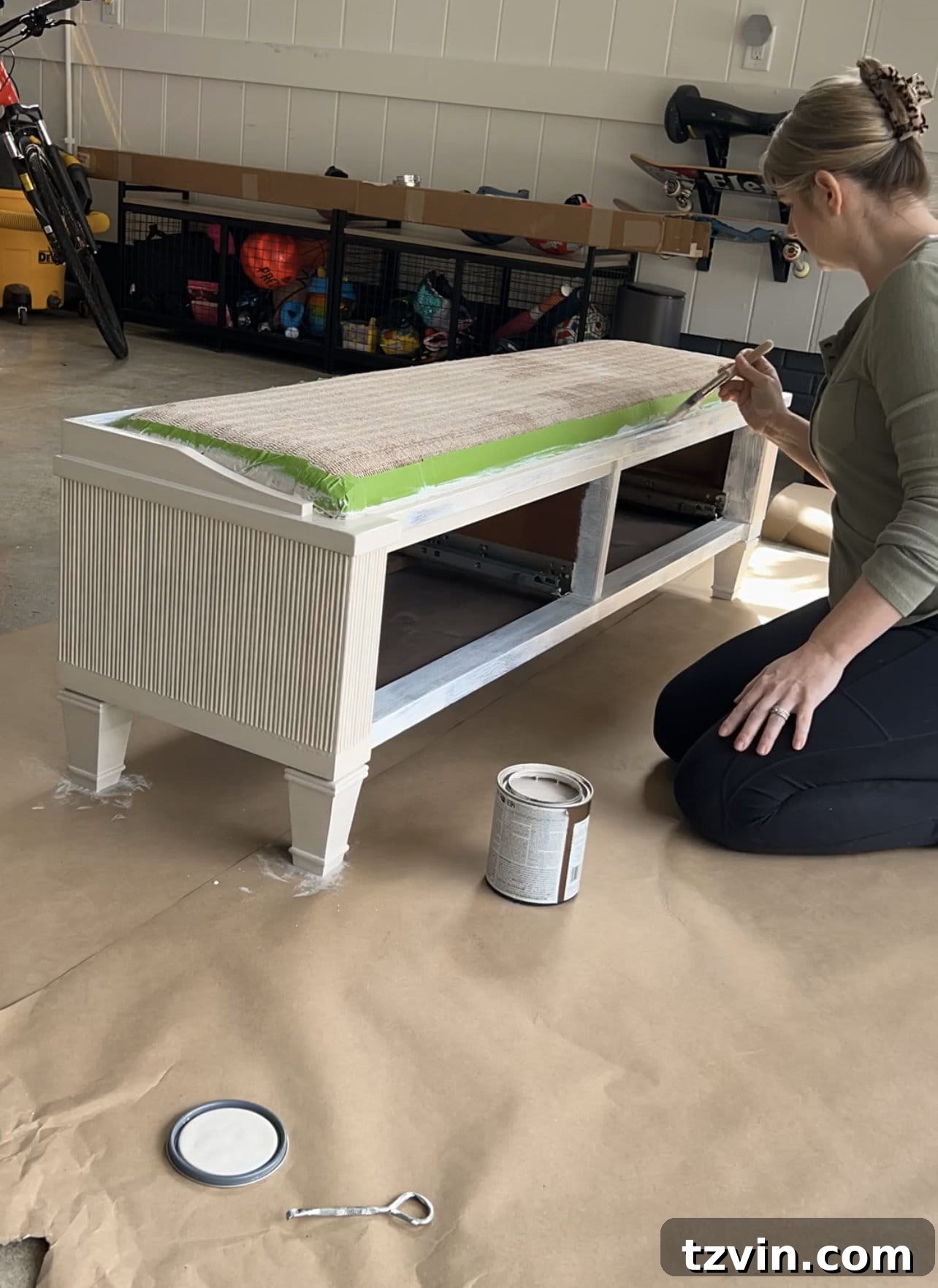 Reeded Elegance: A Shoe Storage Bench Makeover 16 Painting a reeded bench with Sherwin Williams Anew Gray, highlighting the textured details of the molding