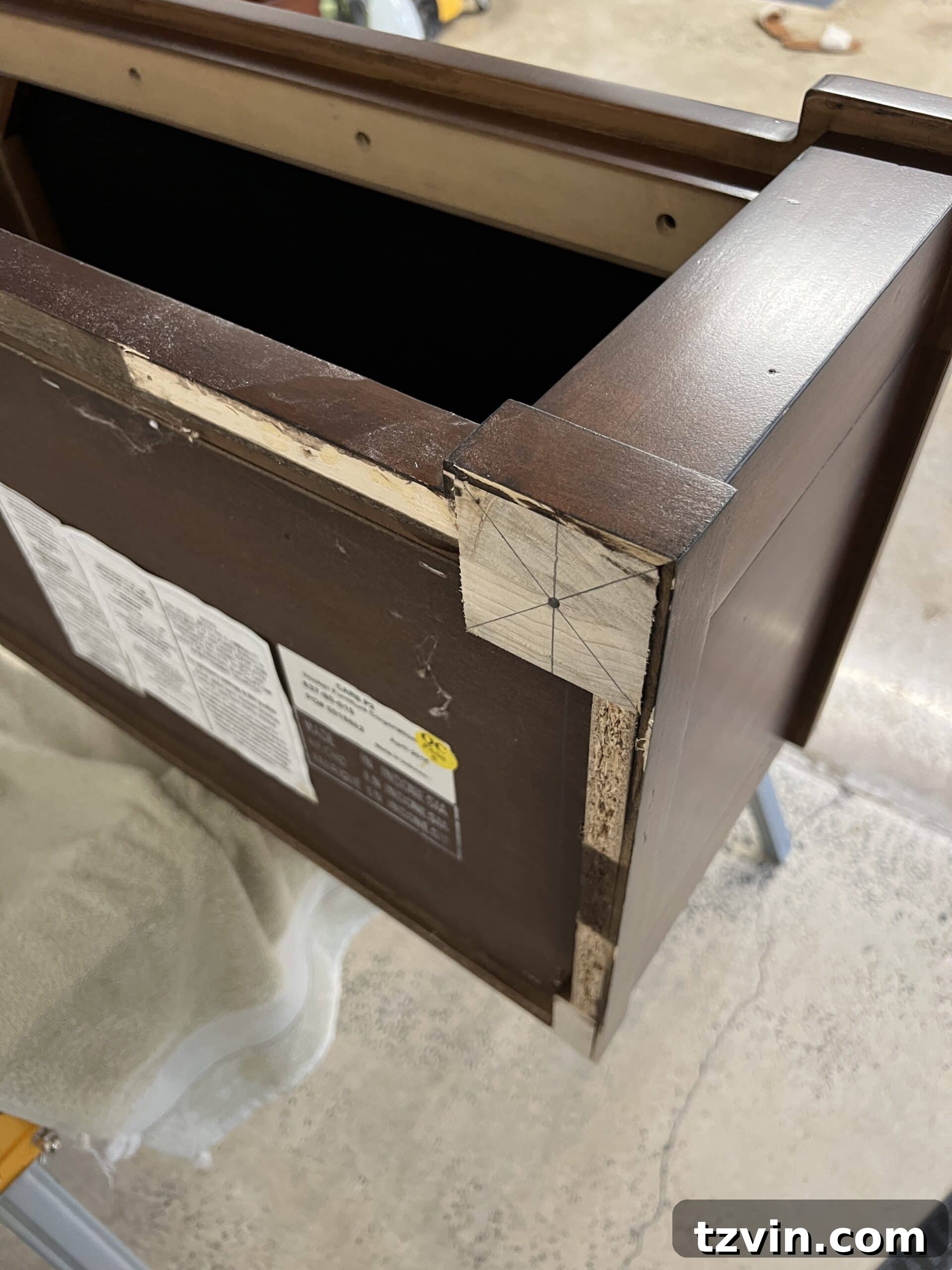 Reeded Elegance: A Shoe Storage Bench Makeover 8 Using a speed square to precisely mark the bottom of the bench for new furniture leg placements