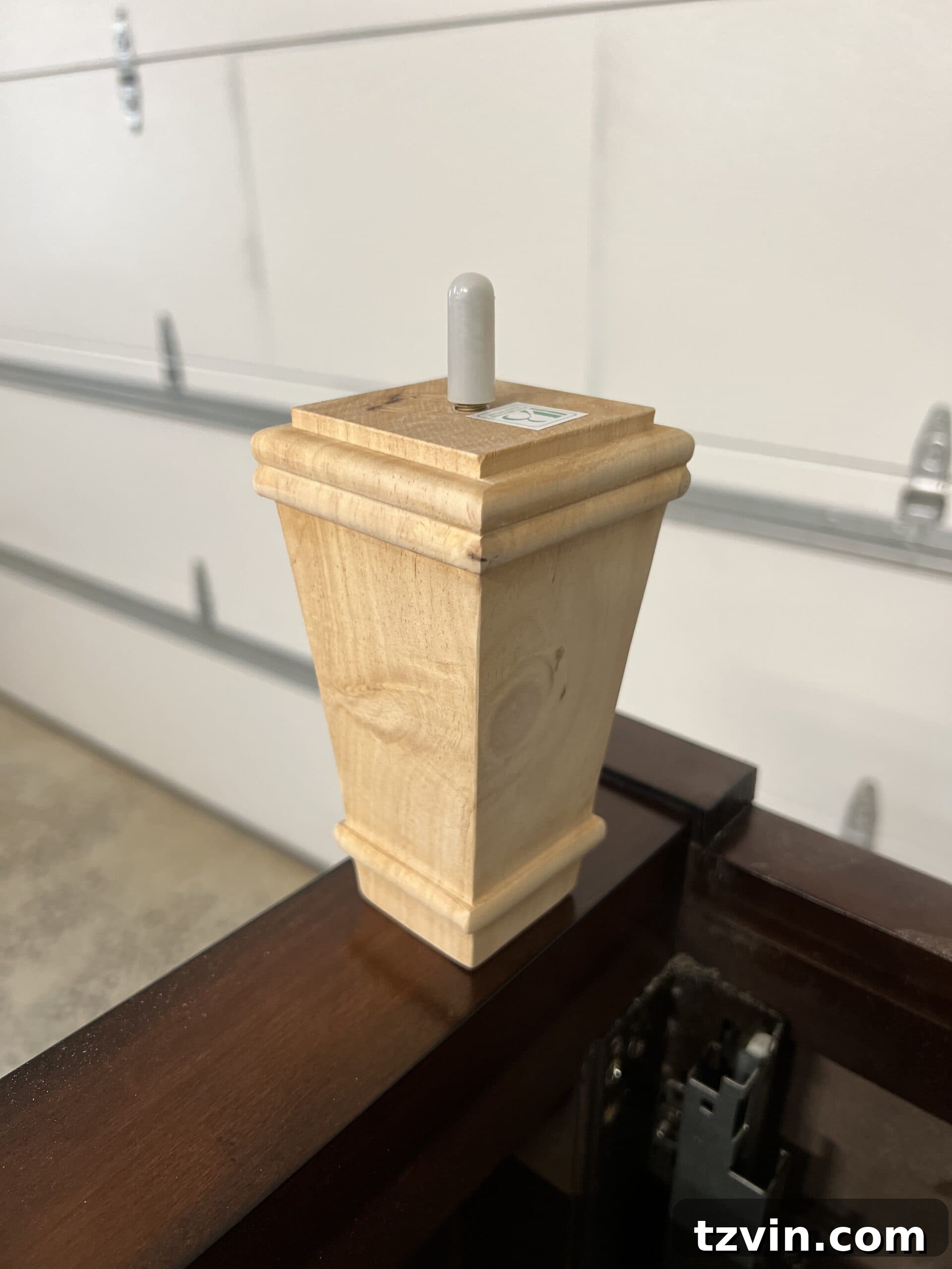 Reeded Elegance: A Shoe Storage Bench Makeover 9 Collection of new pyramid-shaped unfinished wood furniture legs ready to replace the old ones, showcasing their sleek design