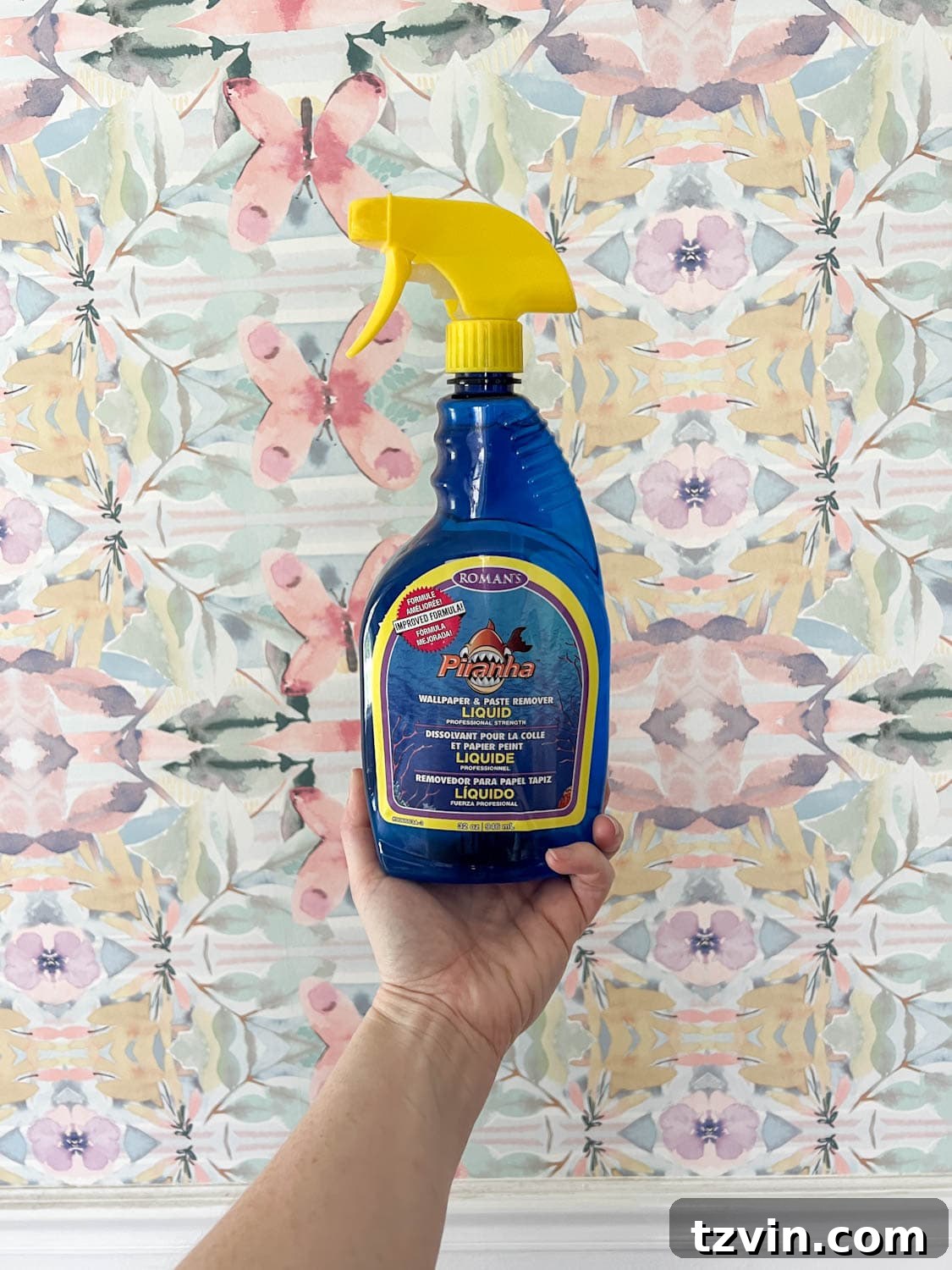 Demonstration of how to remove wallpaper using a store-bought wallpaper stripper
