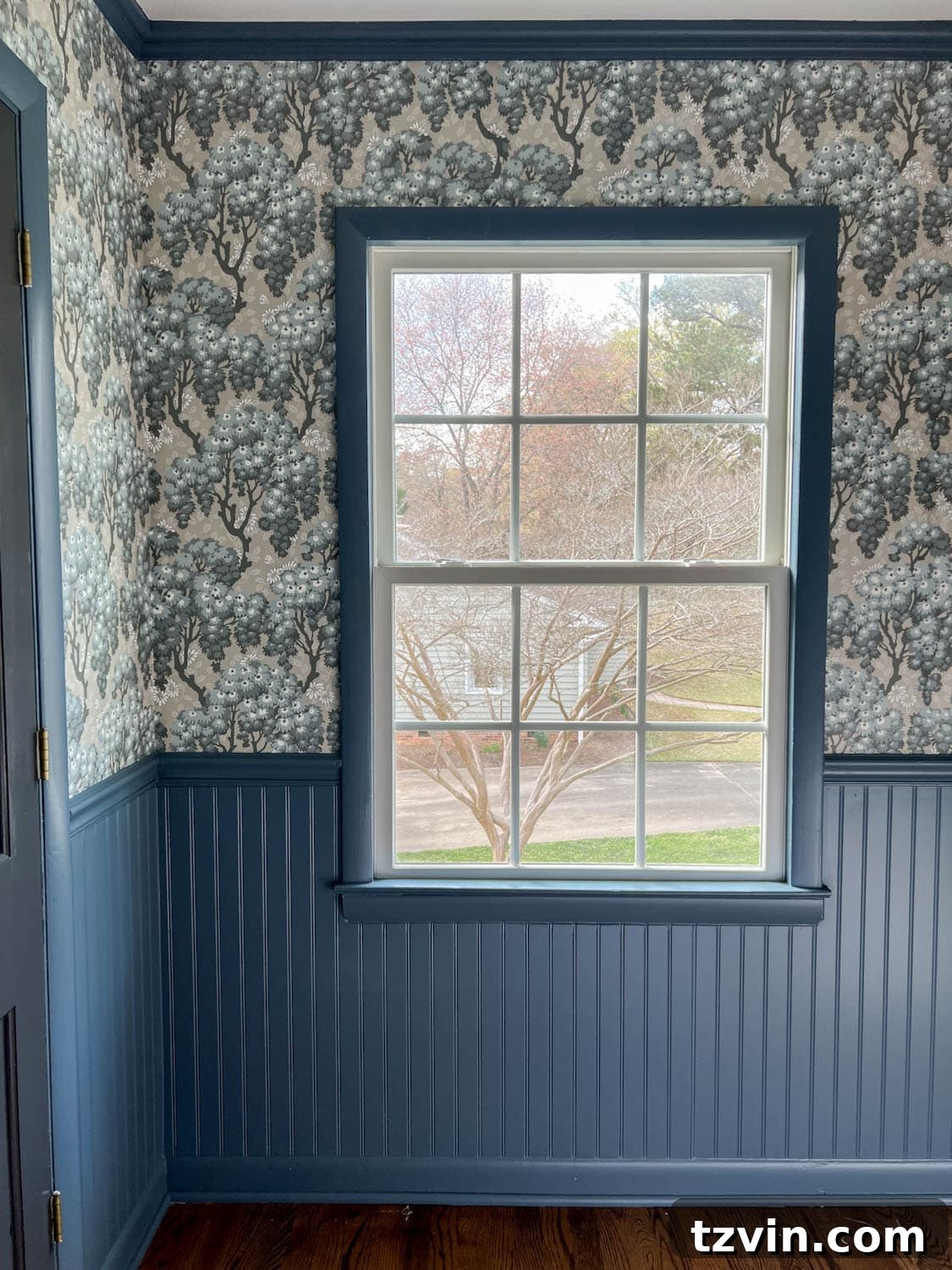 Unleash Maximalism: 30 Vintage Scandinavian Wallpaper Designs 4 A charming bedroom featuring beadboard painted Sherwin Williams Smoky Blue, perfectly accented by Sandberg Wallpaper Ragnvi Indigo Blue, embodying Swedish cottage style.