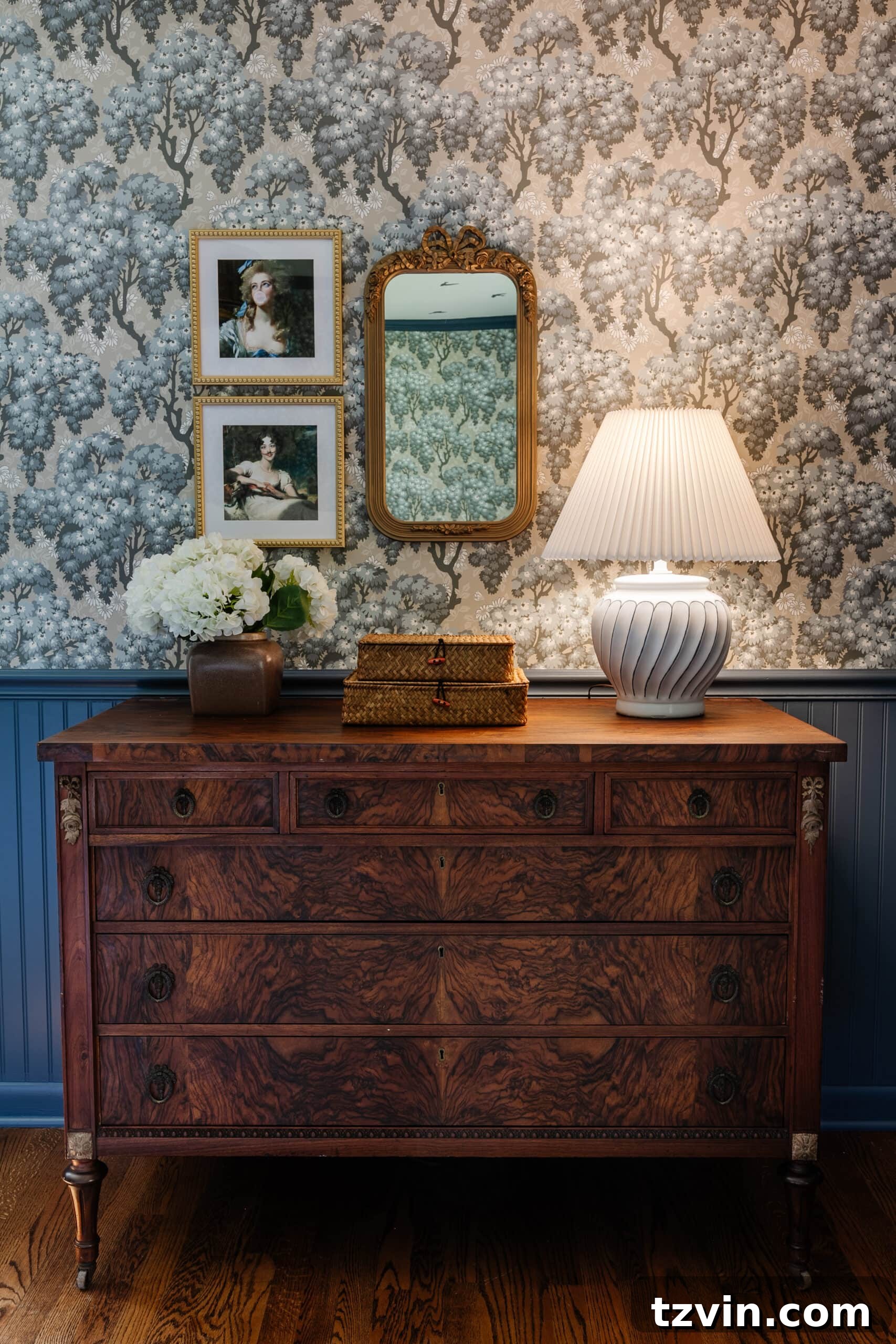 Burl dresser with swedish wallpaper and blue beadboard + antique altered portraits