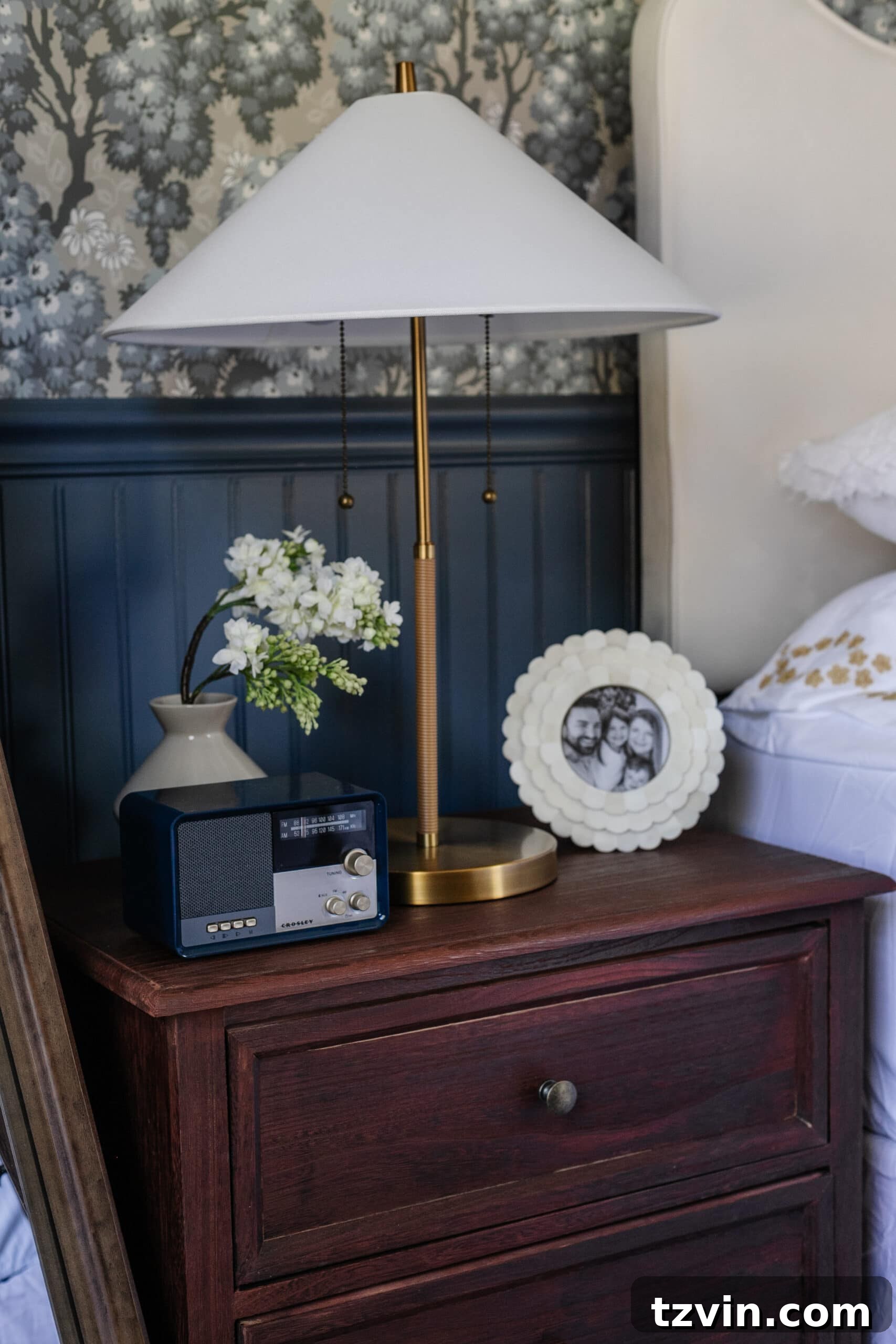 Blue vintage bluetooth radio on nightstand