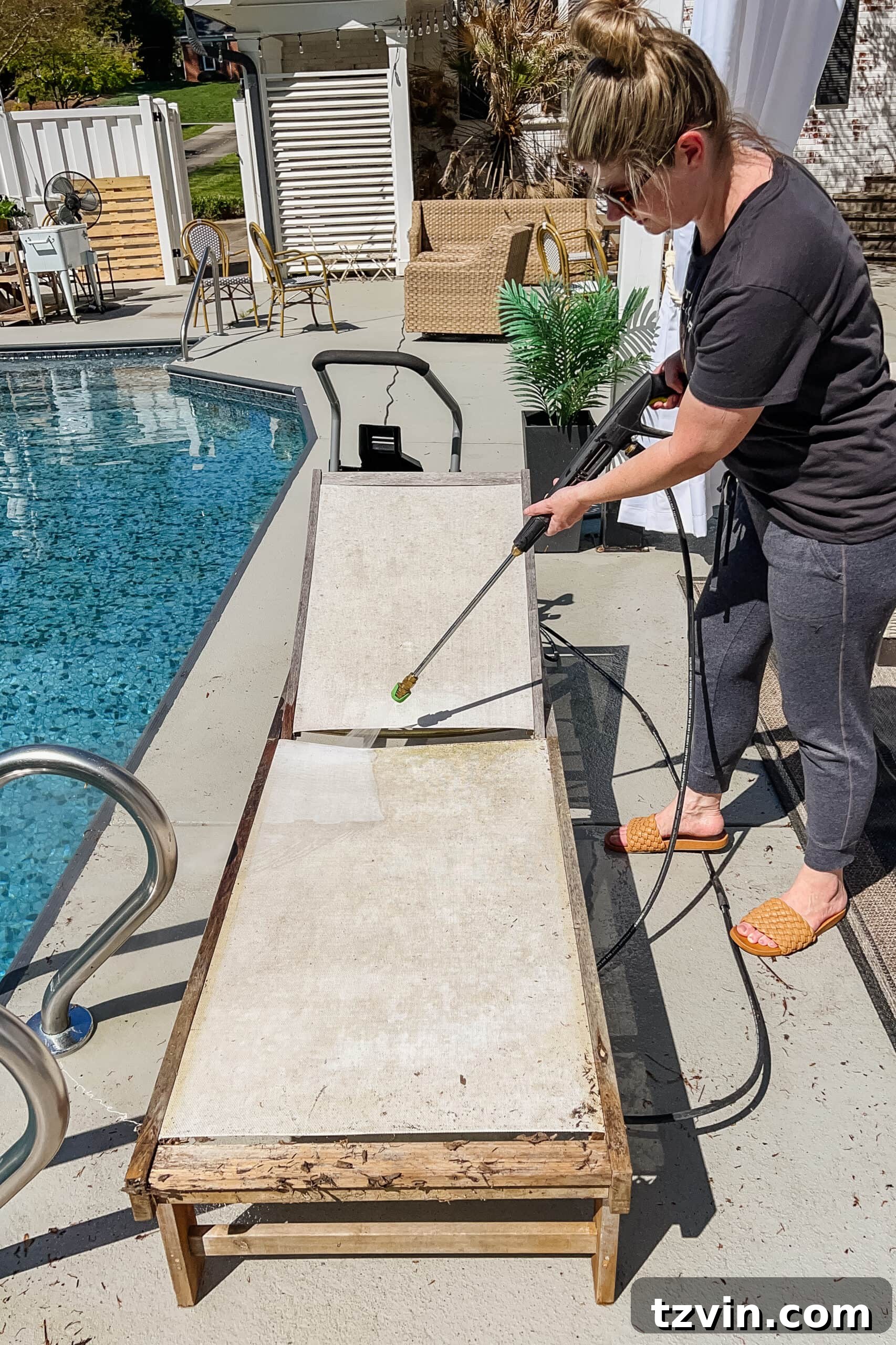 Spring Patio Refresh 21 cleaning patio furniture with a pressure washer to remove mildew and dirt