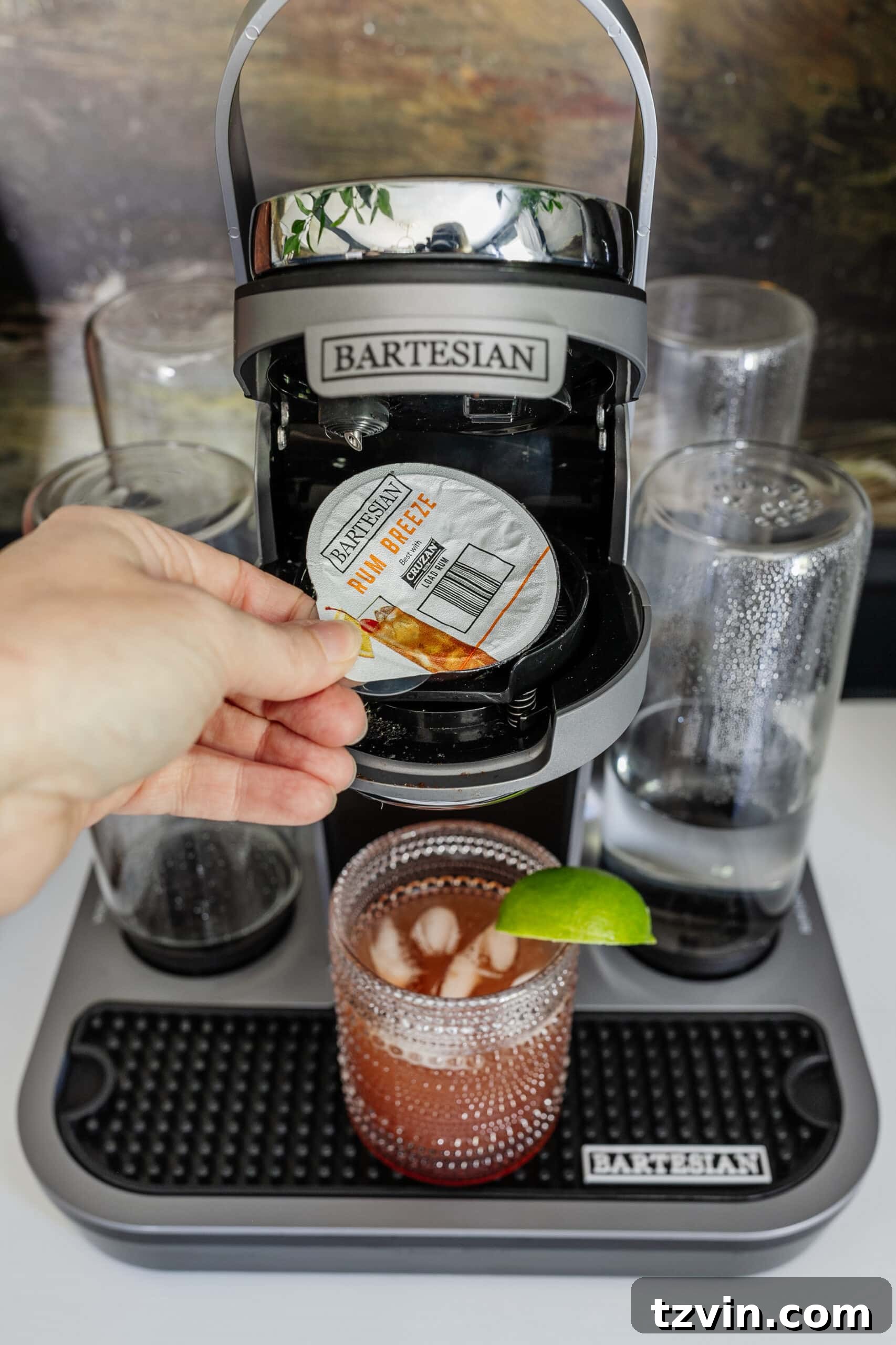 Bartesian Cocktail Maker: The Unvarnished Truth 5 adding a cocktail capsule to a bartesian machine