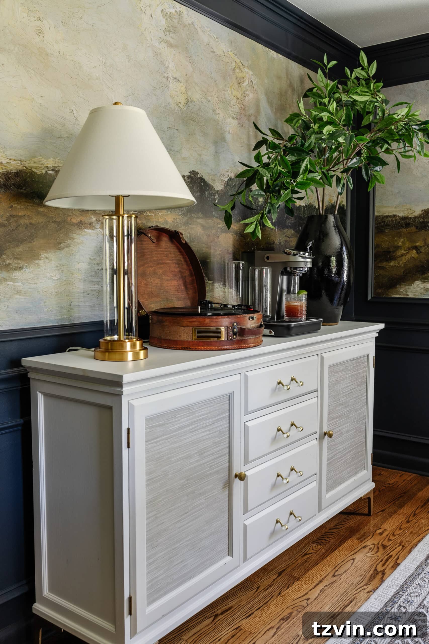 Bartesian Cocktail Maker: The Unvarnished Truth 10 dining room buffet with Bartesian cocktail machine, record player, vase of branches, and lamp